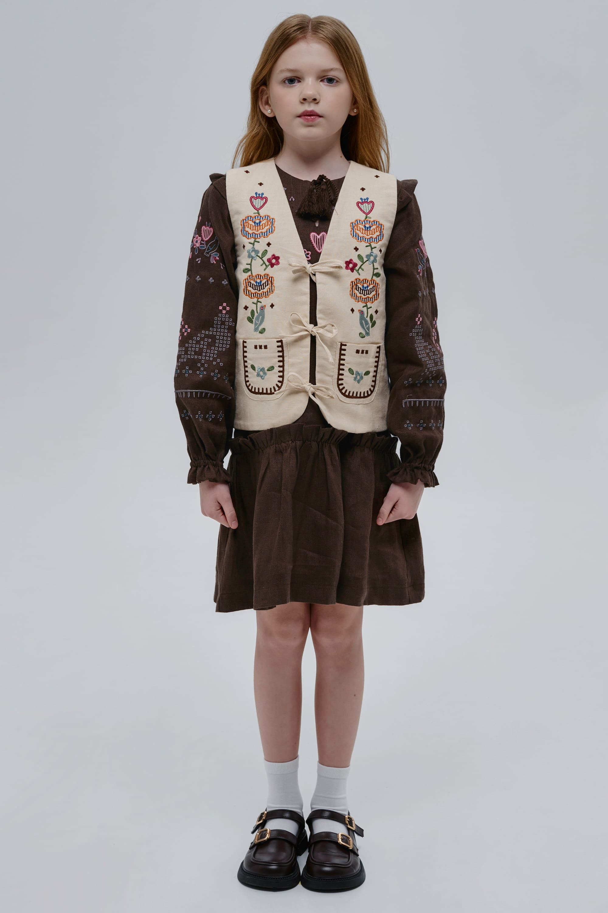 Embroidered beige vest for girl Malvy