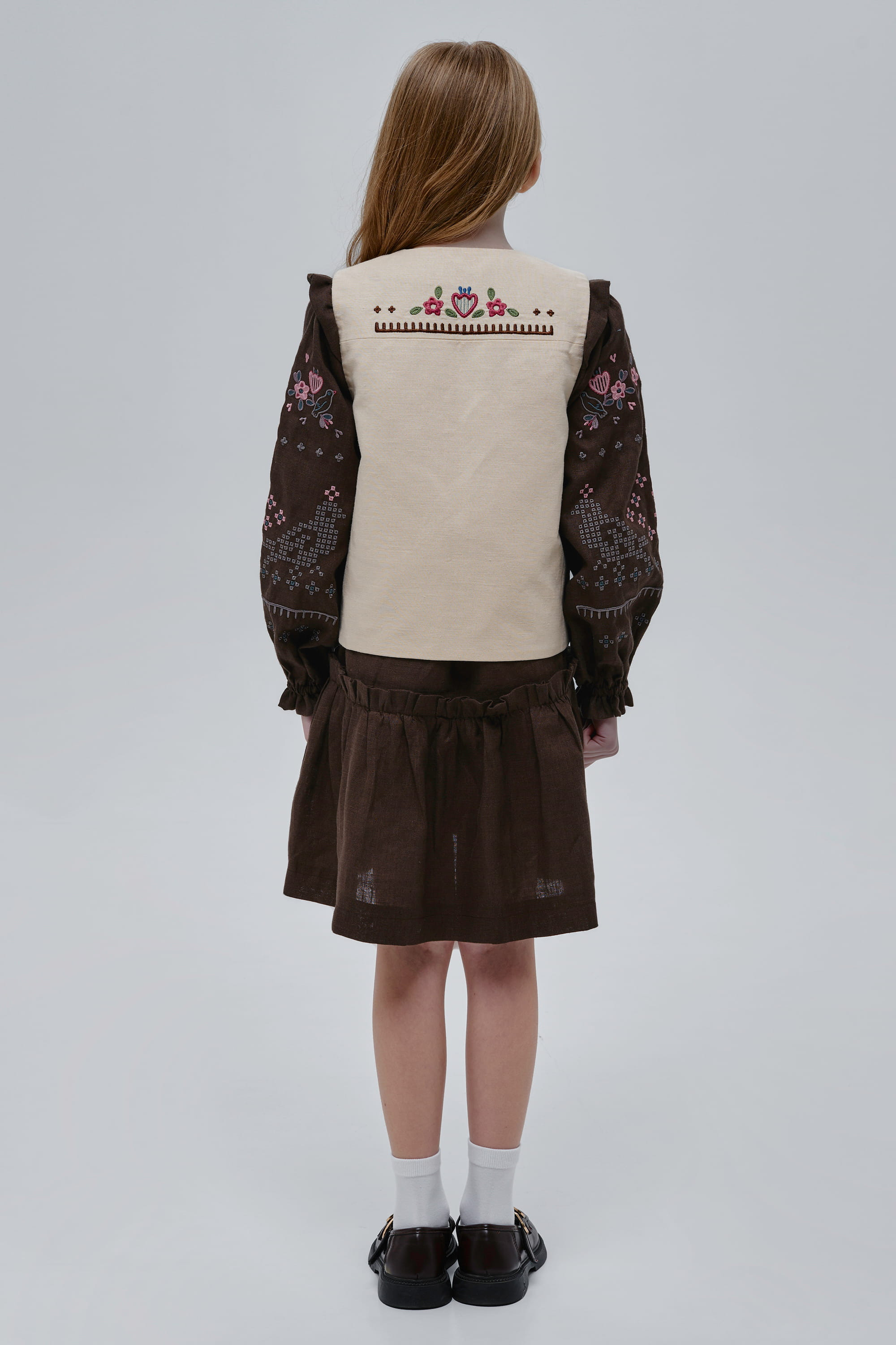 Embroidered beige vest for girl Malvy