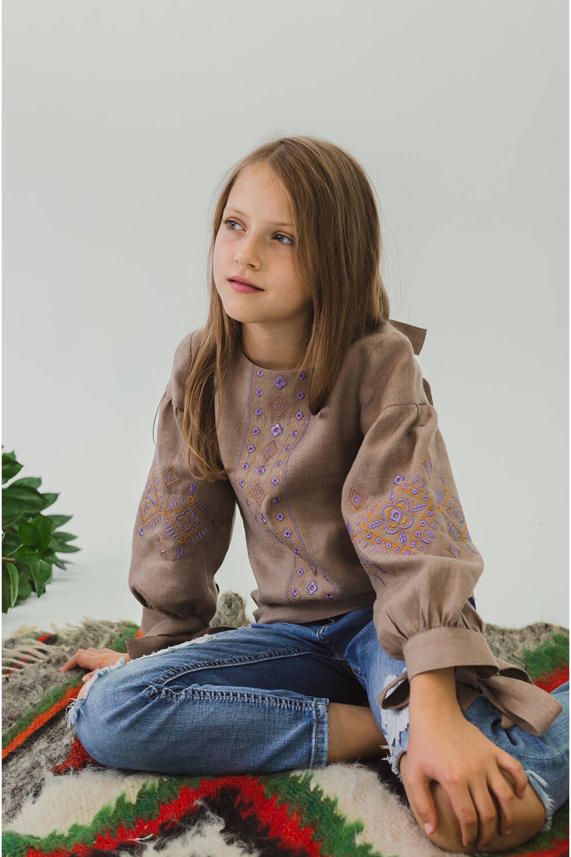 Embroidered blouse for a girl with bsuffe bows Embroidered blouse for a girl with bsuffe bows