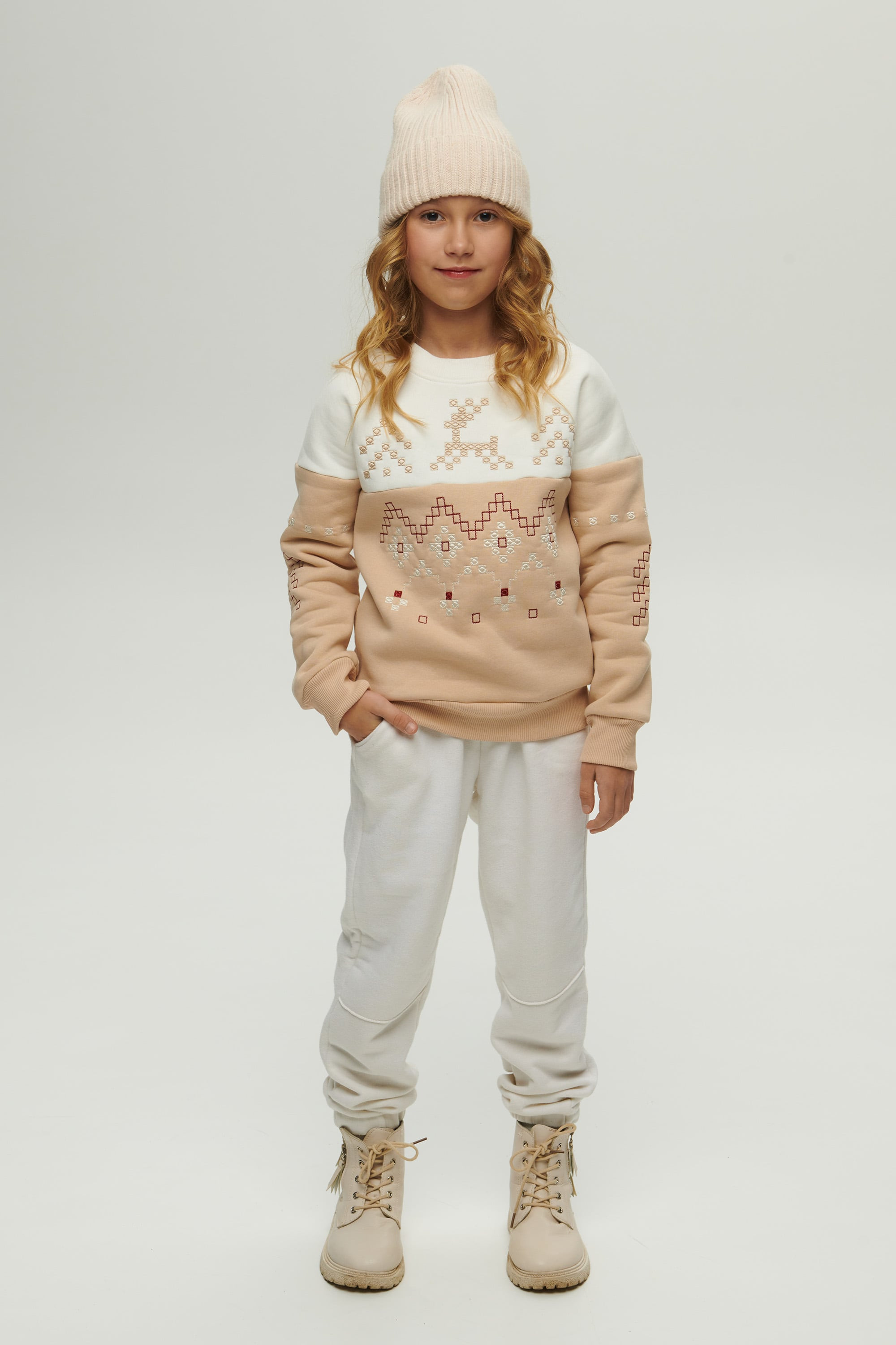 New Year's beige sweatshirt for a girl December