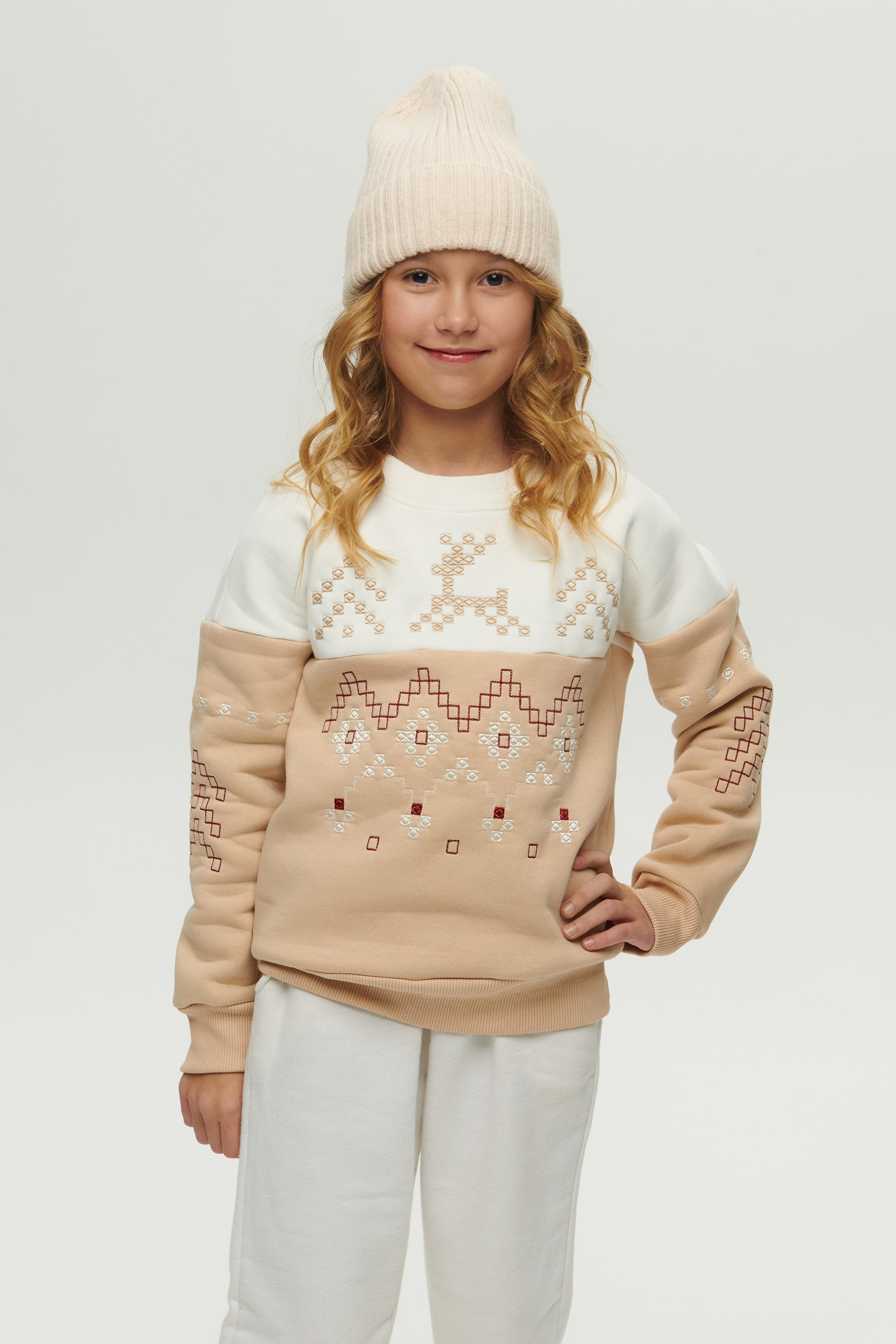 New Year's beige sweatshirt for a girl December
