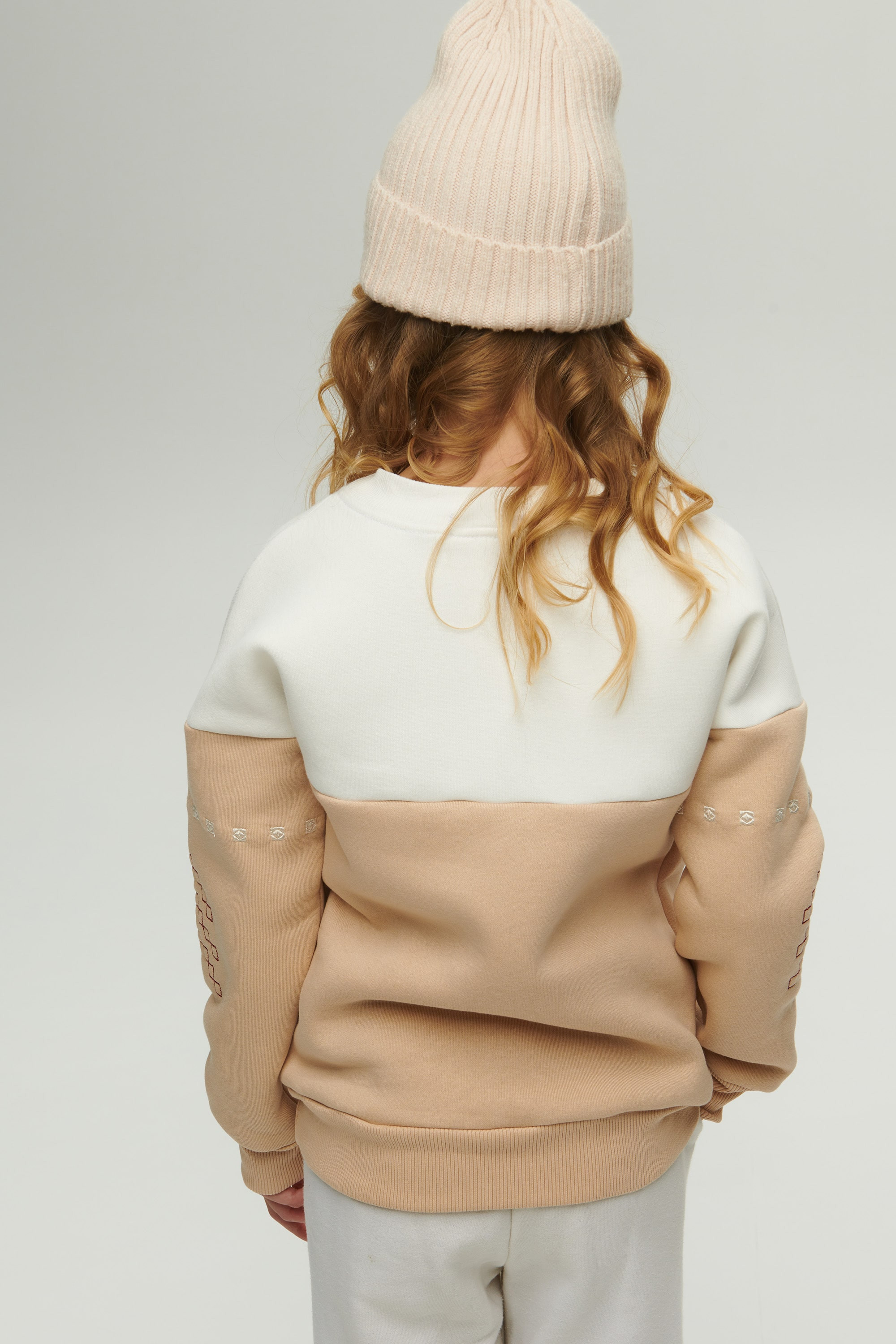 New Year's beige sweatshirt for a girl December