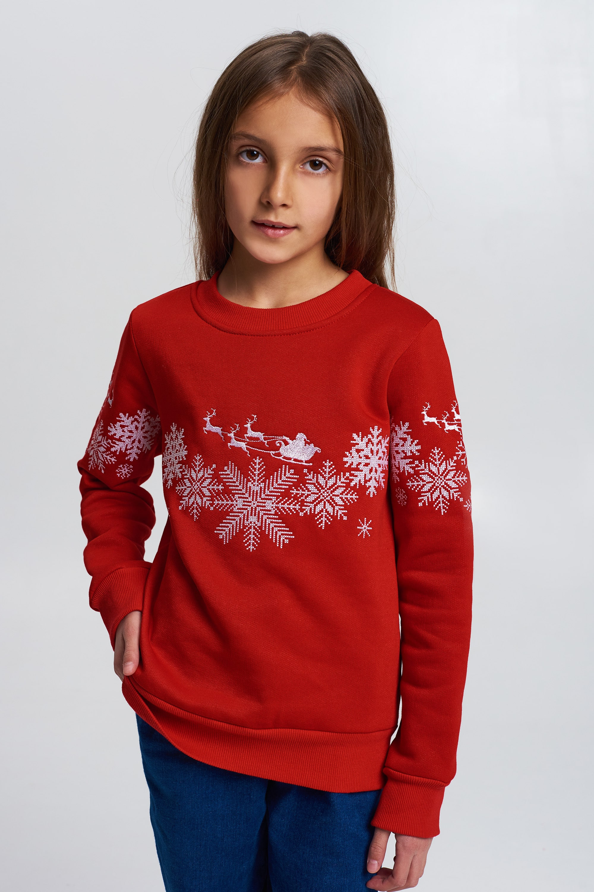 Christmas sweatshirt for a red girl with Santa Claus