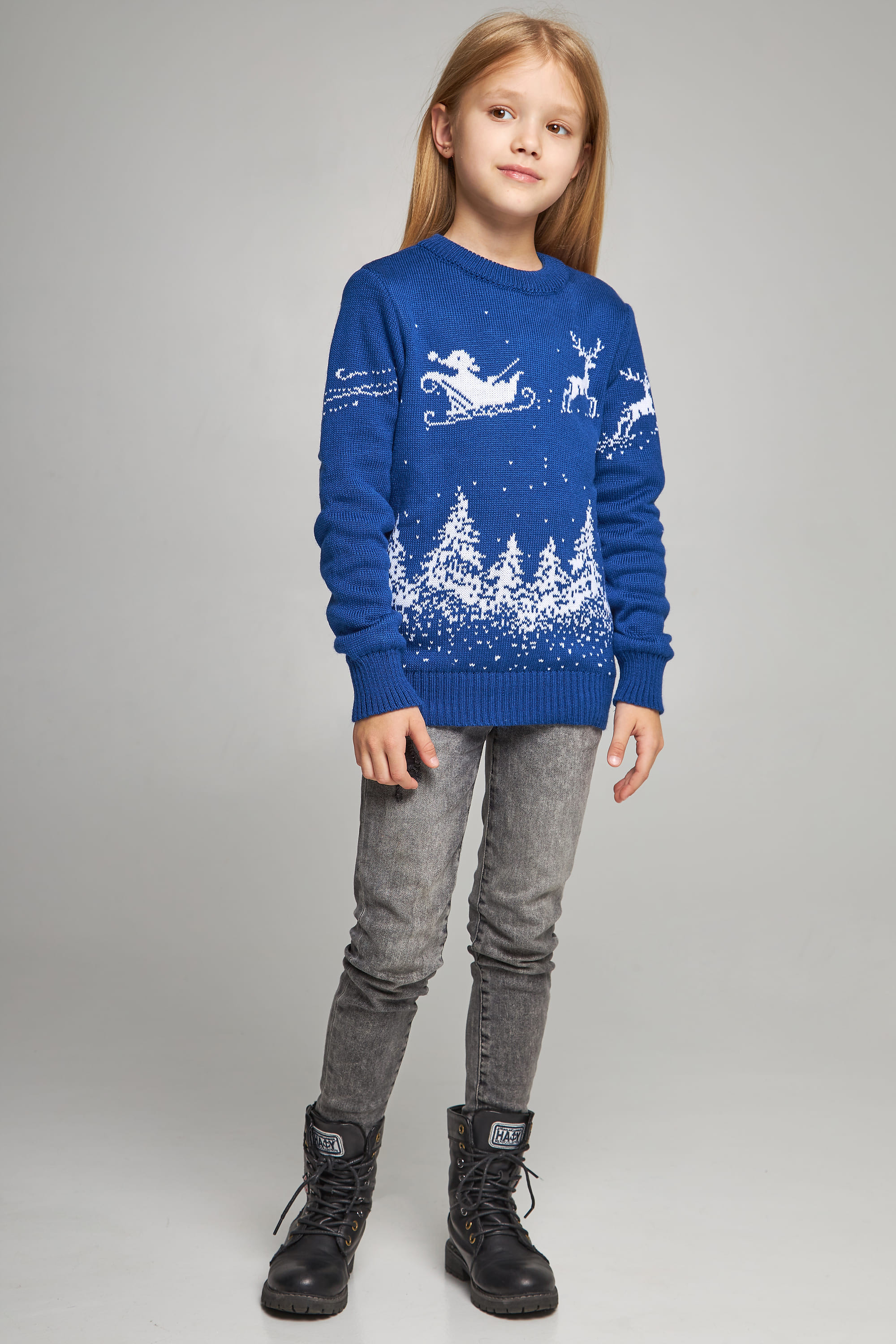 Knitted sweater for a girl Santa Claus with deer blue