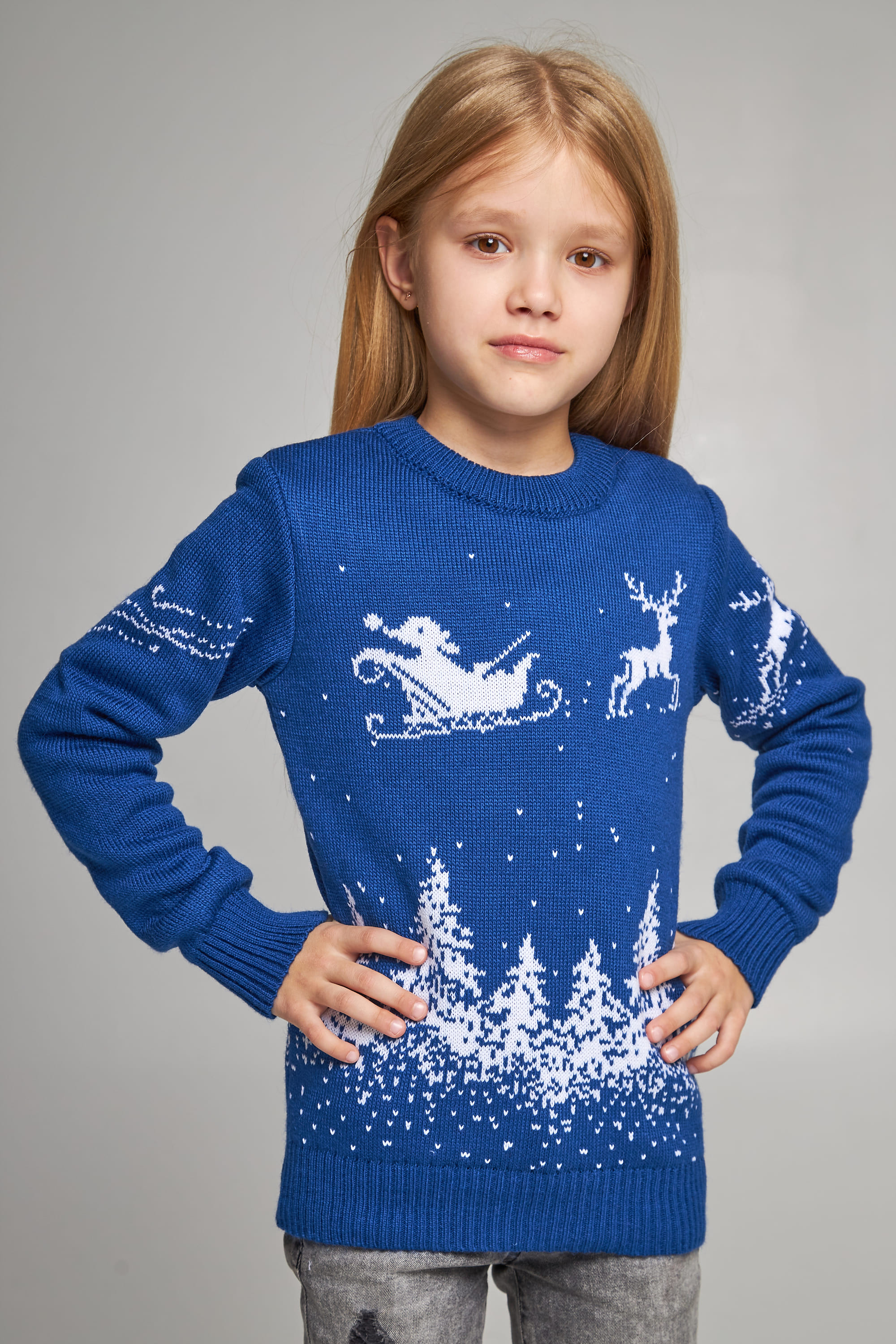 Knitted sweater for a girl Santa Claus with deer blue