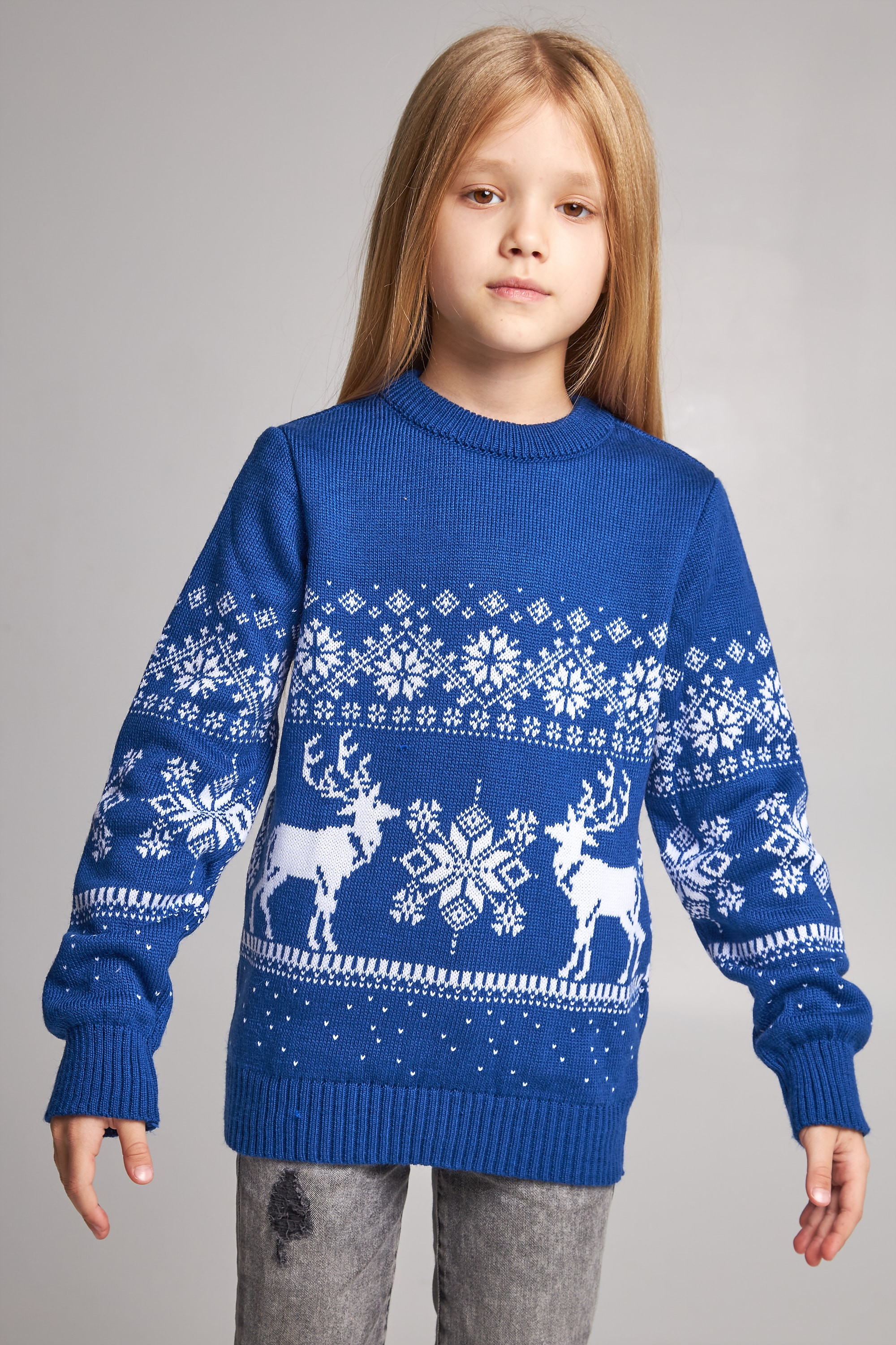 Knitted sweater for a girl snowflakes with deer blue