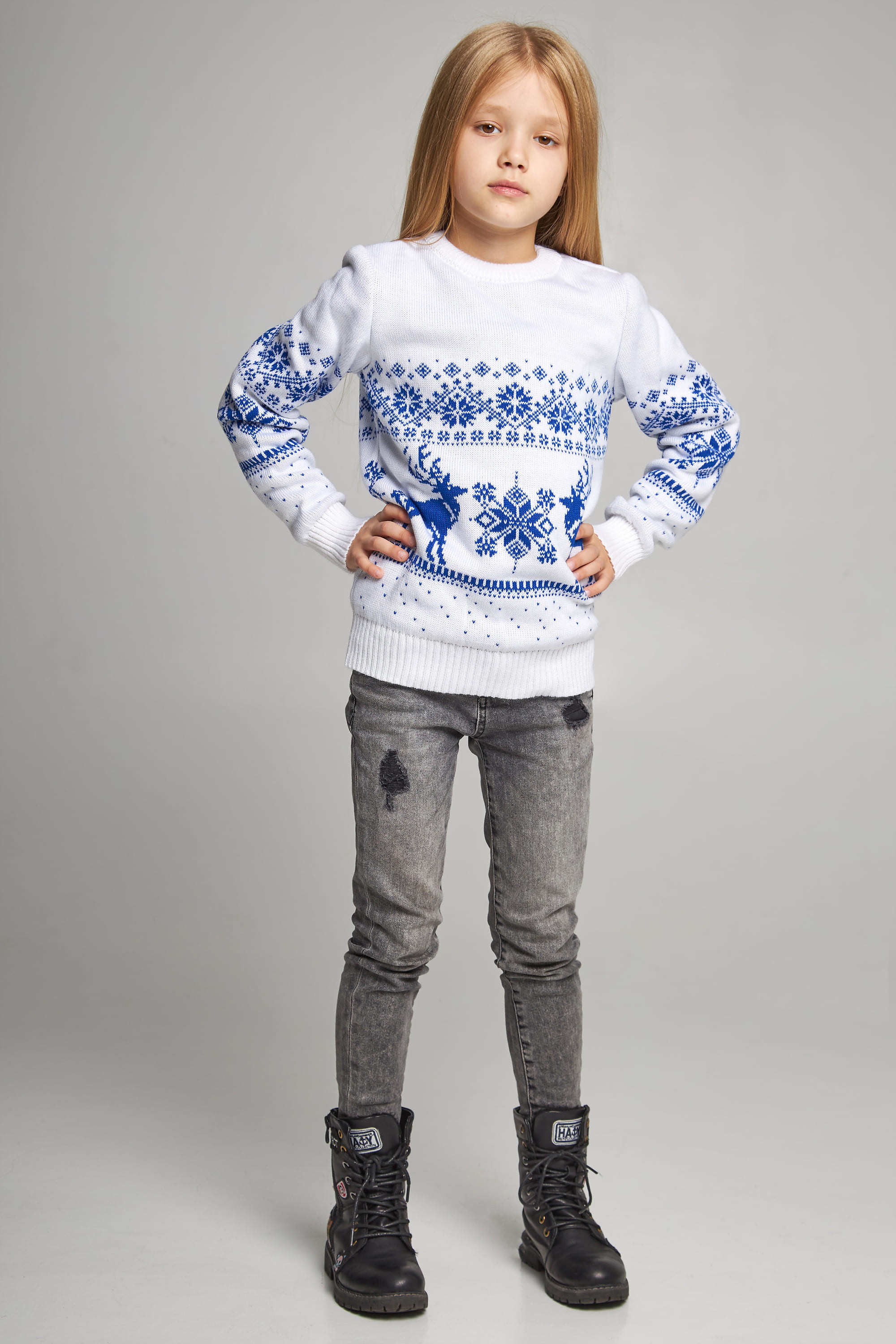 Knitted sweater for a girl Snowflakes with deer Knitted sweater for a girl Snowflakes with deer