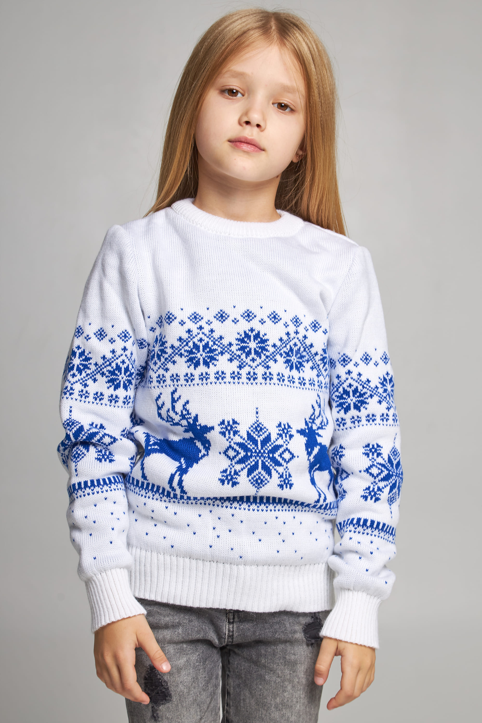 Knitted sweater for a girl Snowflakes with deer Knitted sweater for a girl Snowflakes with deer