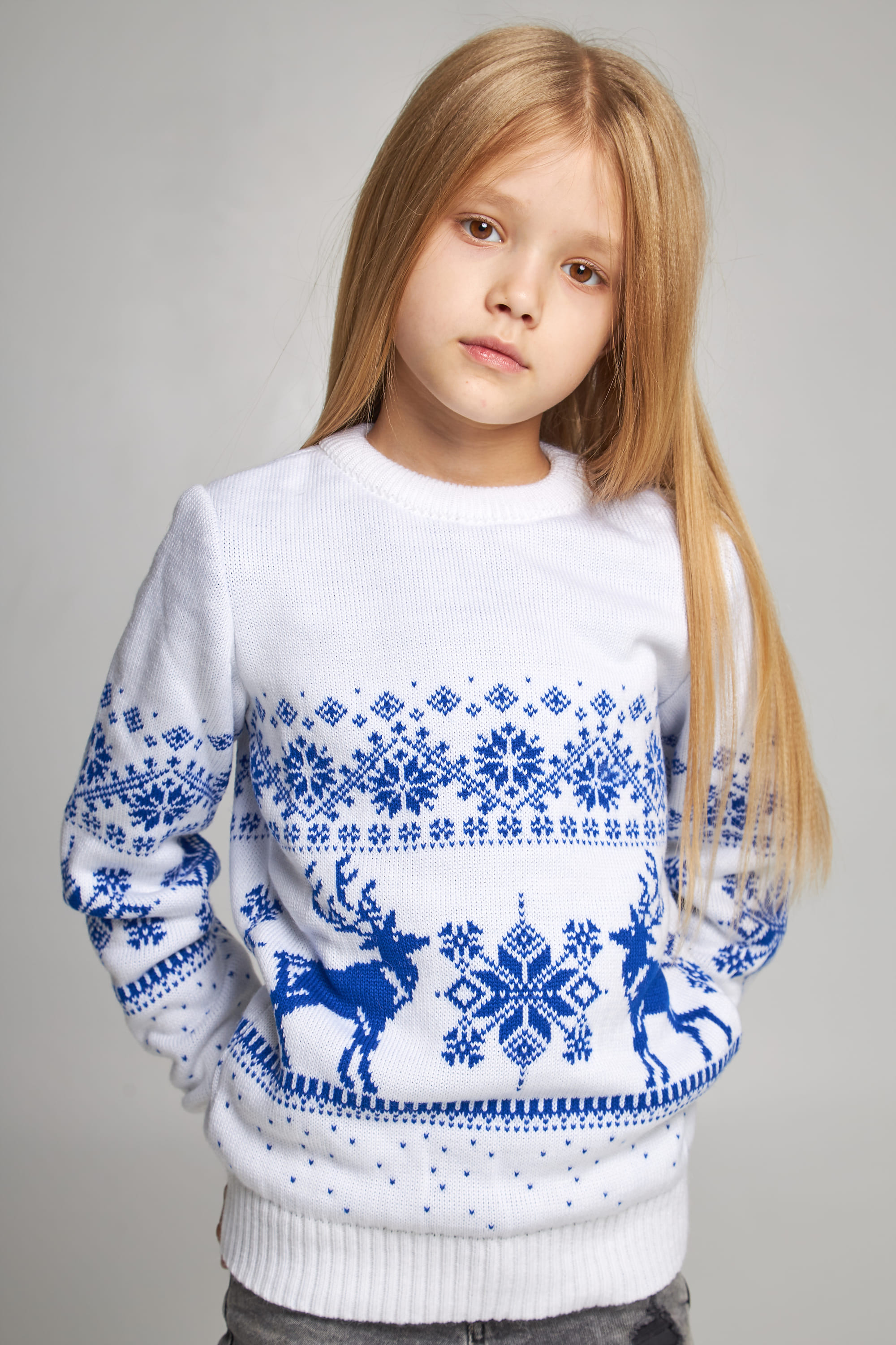 Knitted sweater for a girl Snowflakes with deer Knitted sweater for a girl Snowflakes with deer