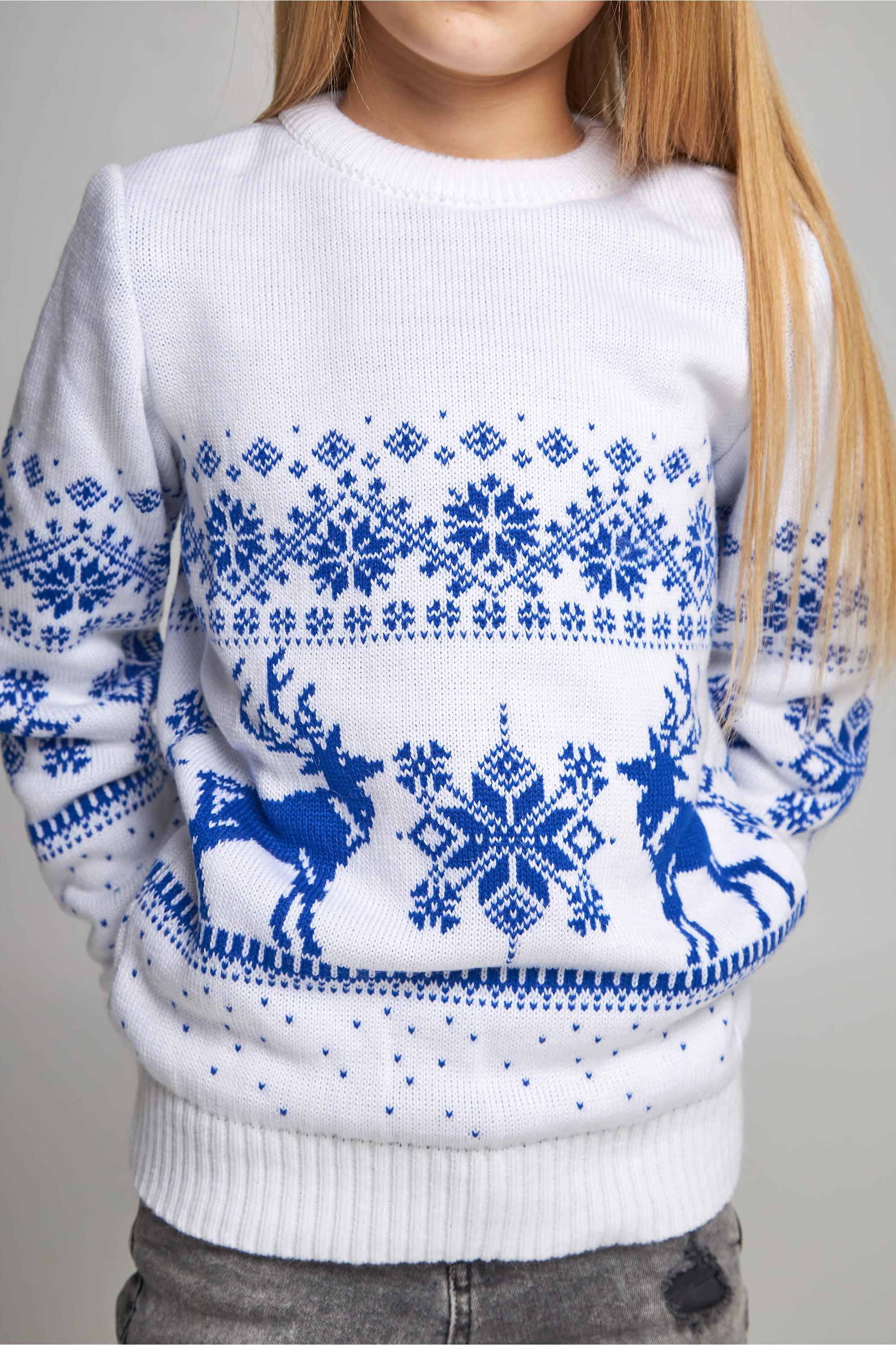 Knitted sweater for a girl Snowflakes with deer Knitted sweater for a girl Snowflakes with deer