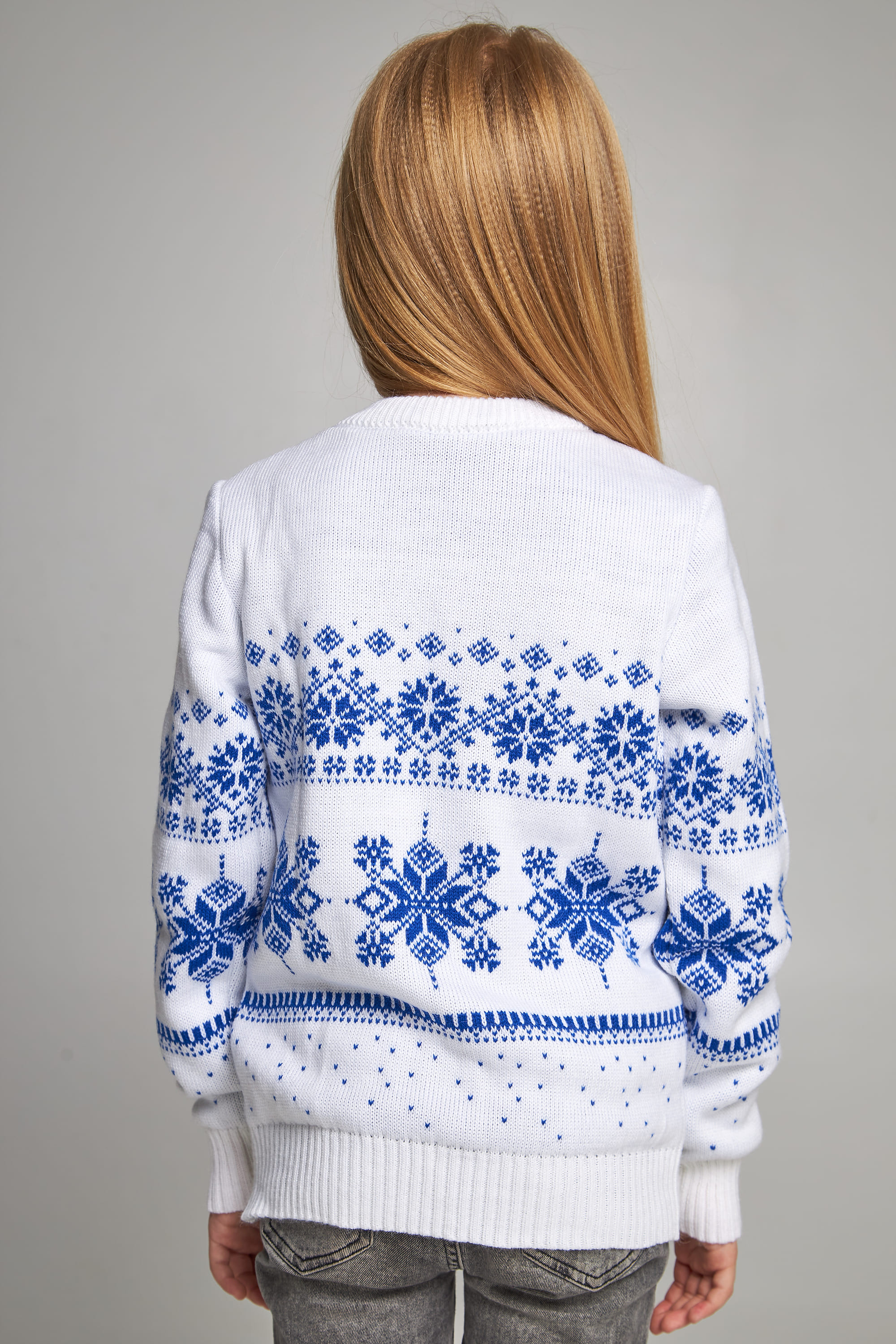 Knitted sweater for a girl Snowflakes with deer Knitted sweater for a girl Snowflakes with deer