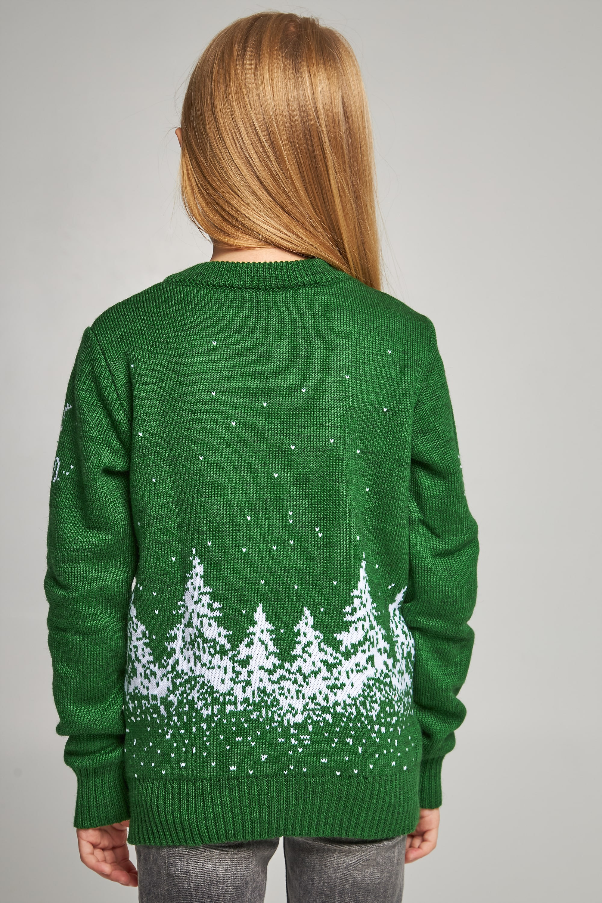 Knitted sweater for a girl snowflakes with deer green