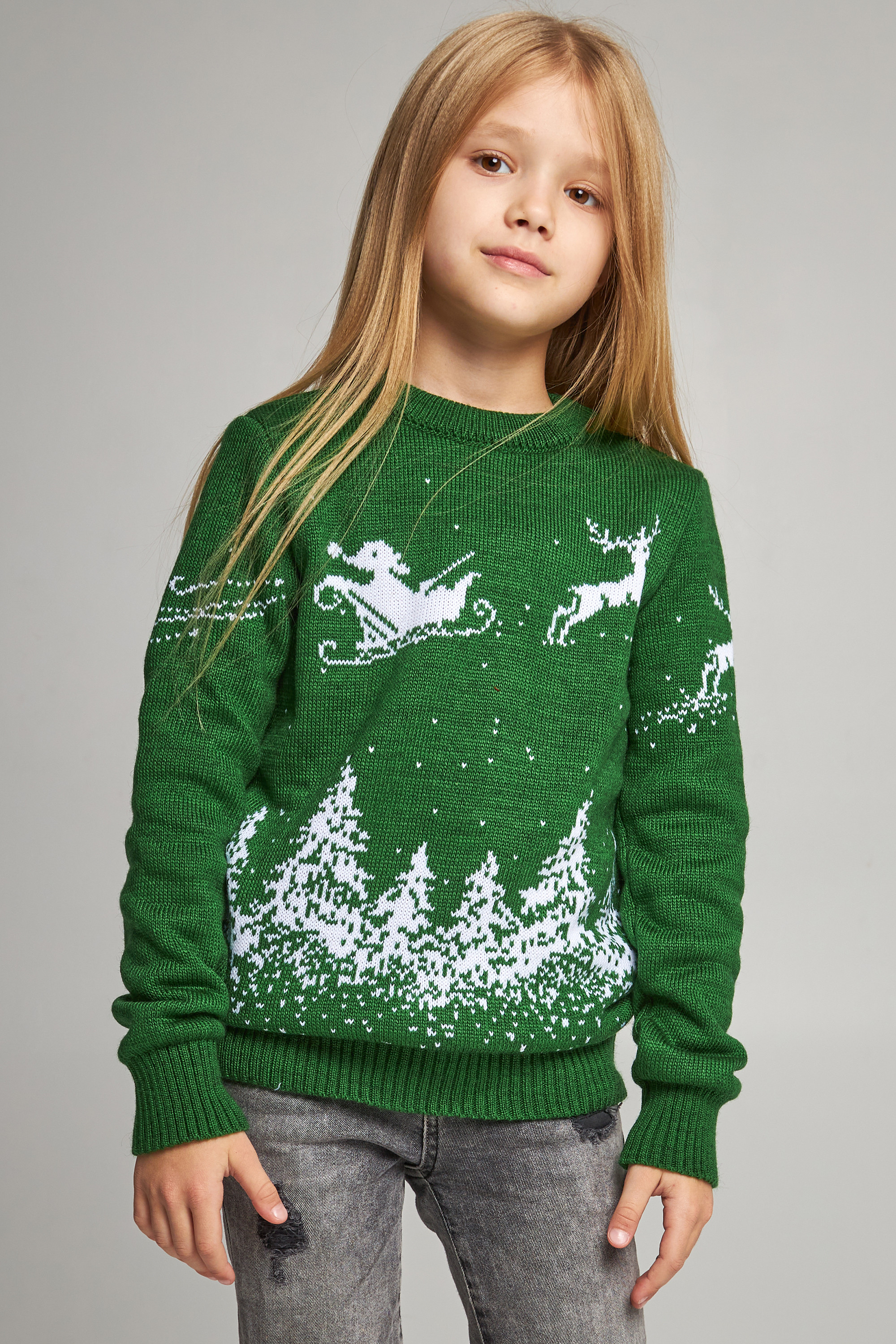 Knitted sweater for a girl snowflakes with deer green