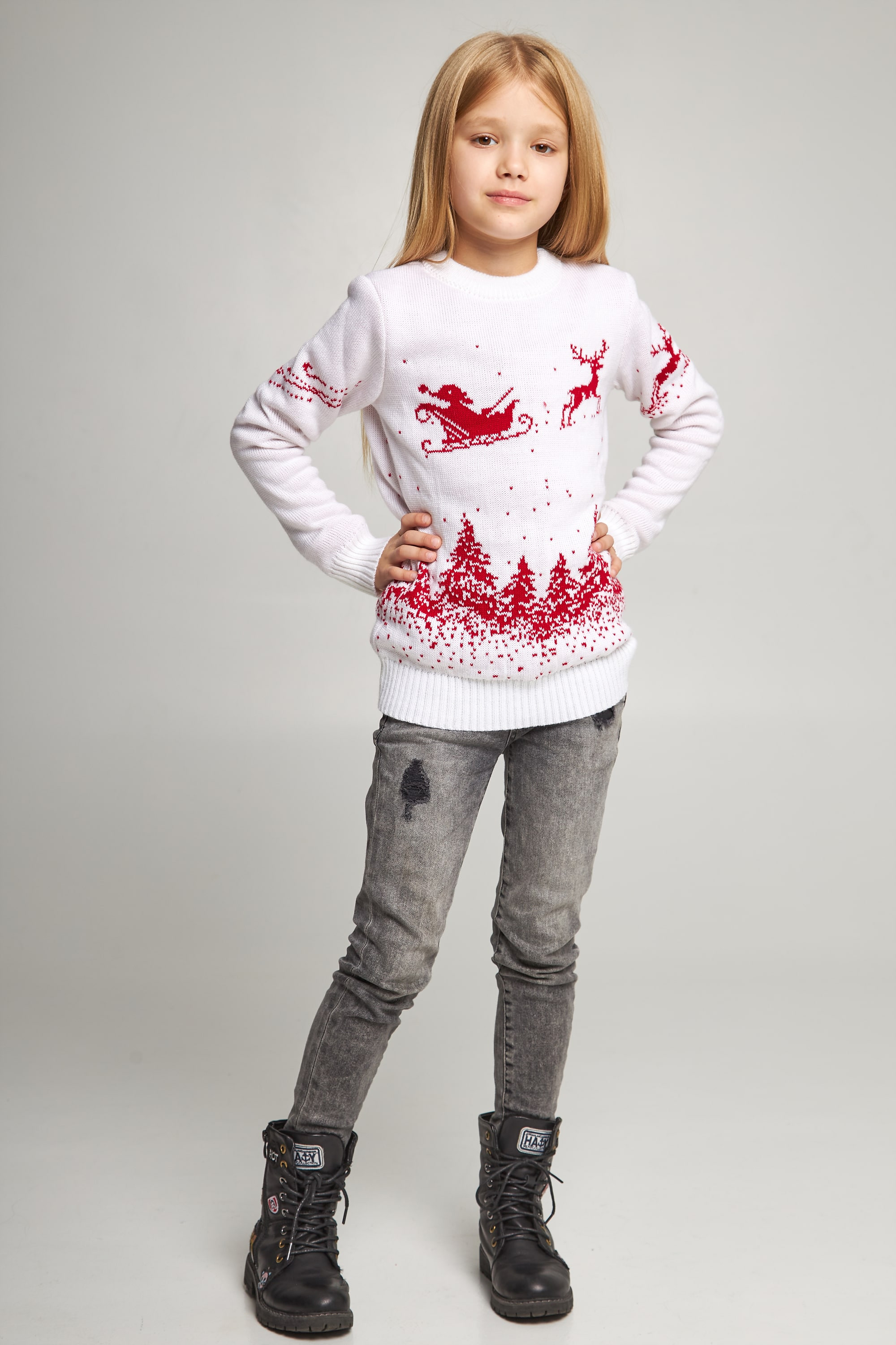 Knitted sweater for a girl snowflakes with deer white