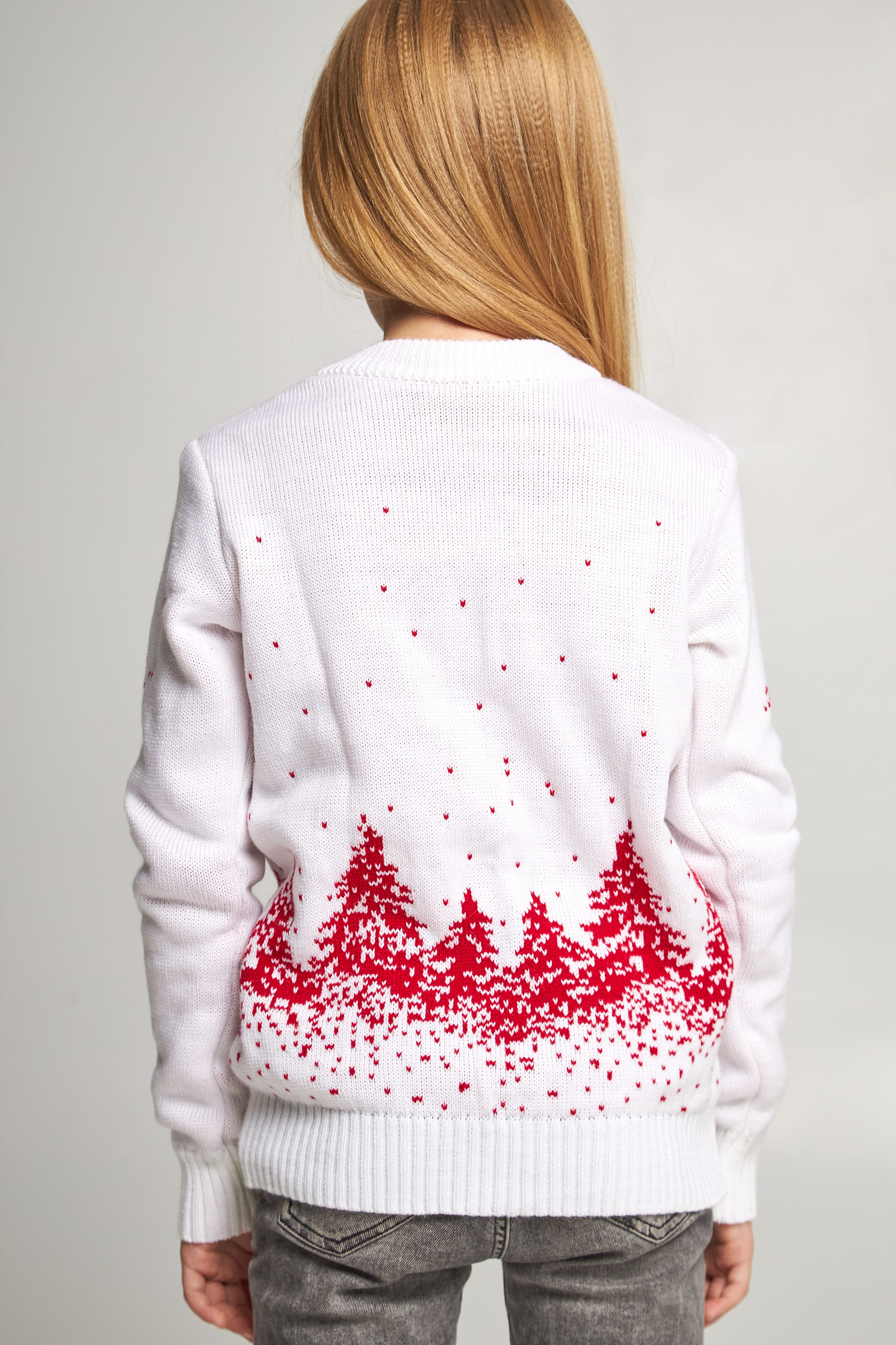 Knitted sweater for a girl snowflakes with deer white