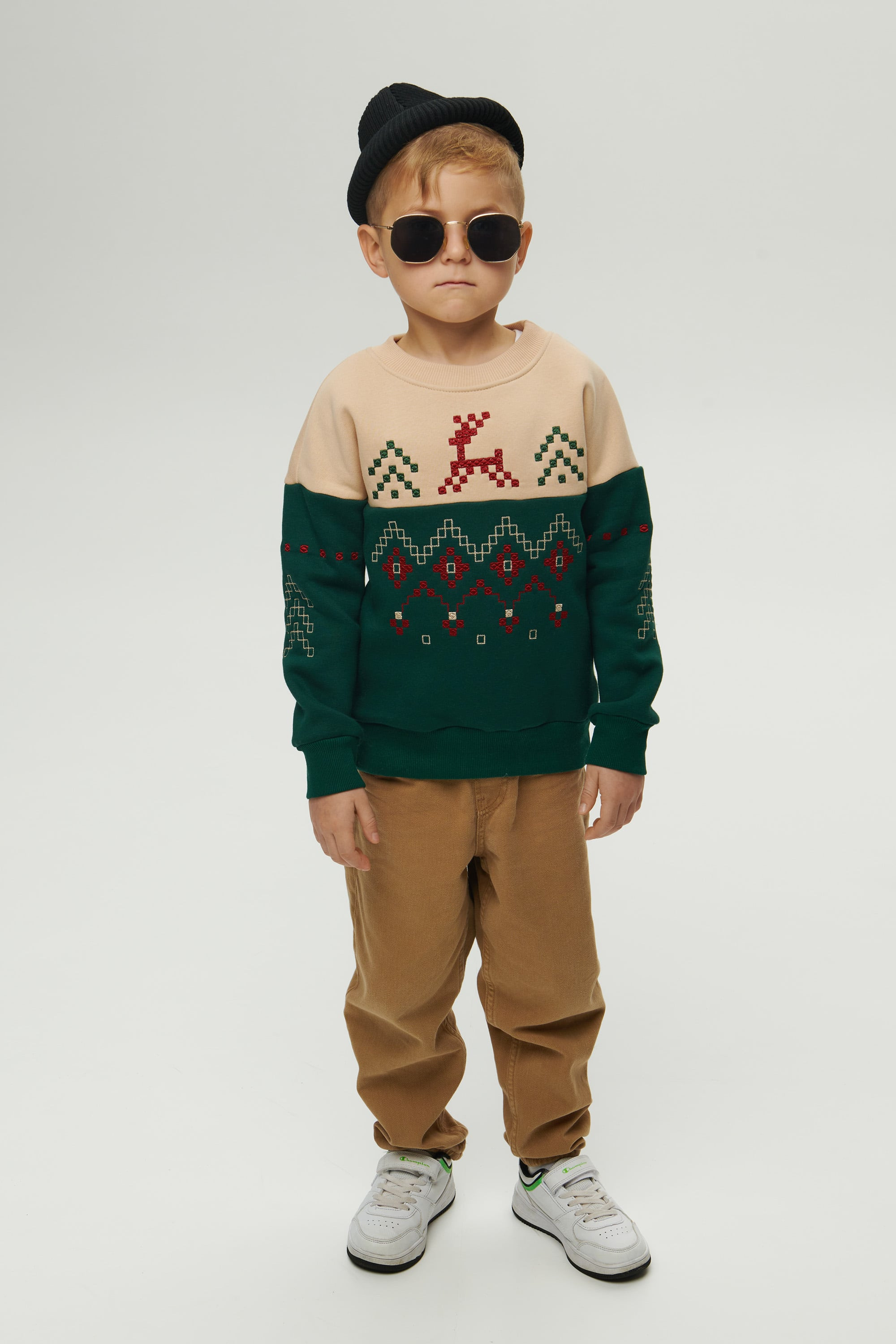 New Year's green sweatshirt for a boy December