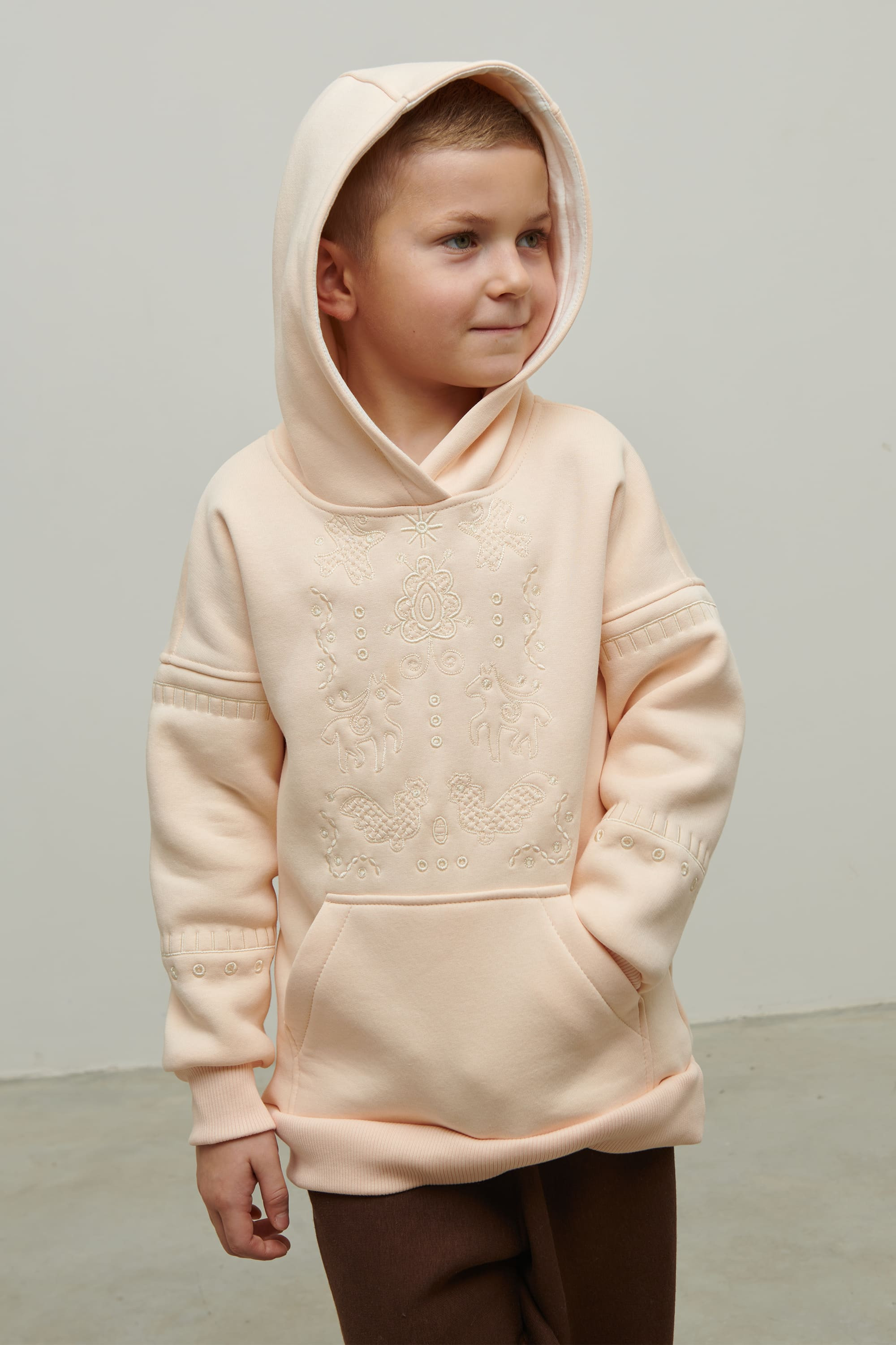 Beige hoodie for a boy Svyatko