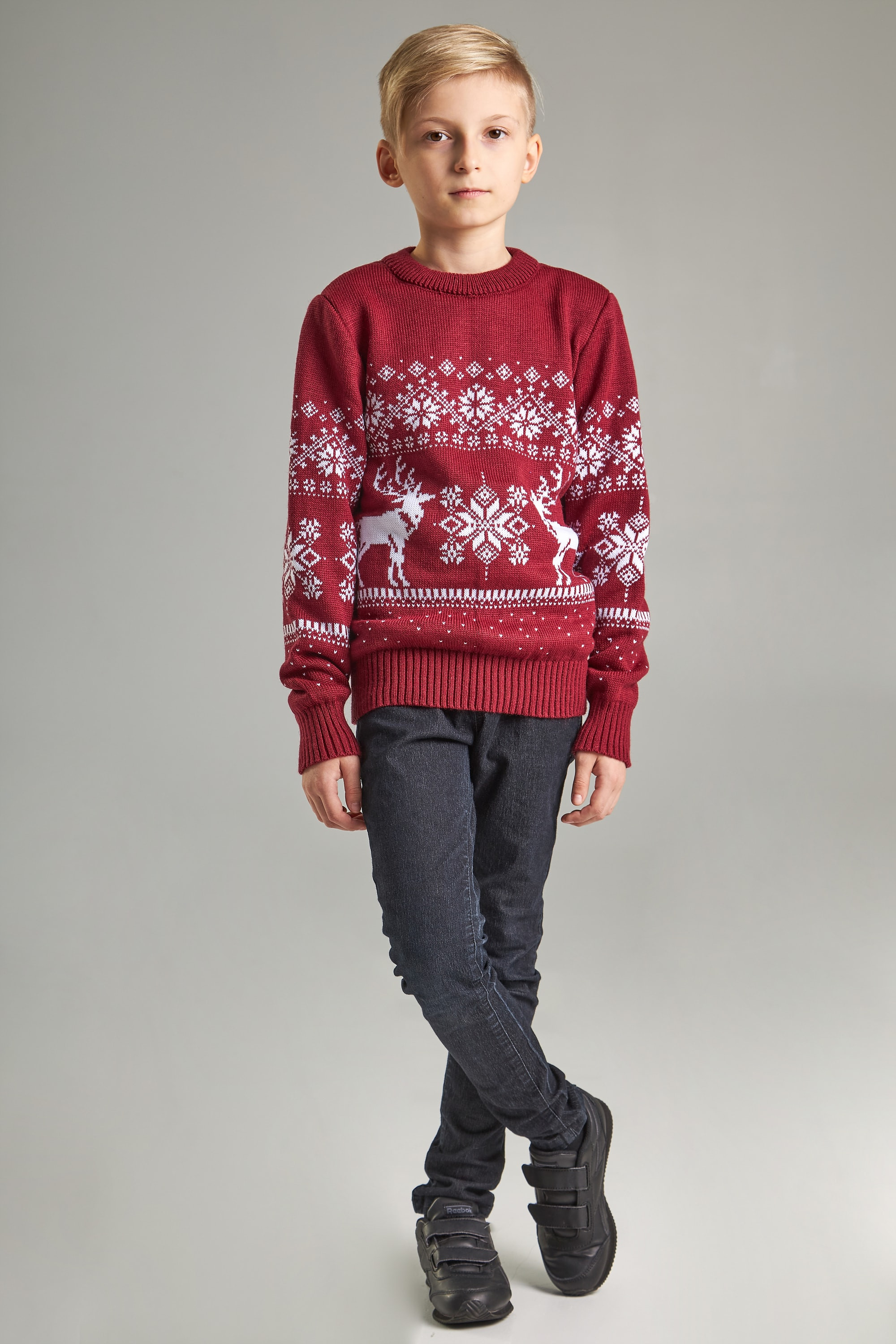 New Year's knitted children's sweaters for two Santa Claus with deer burgundy