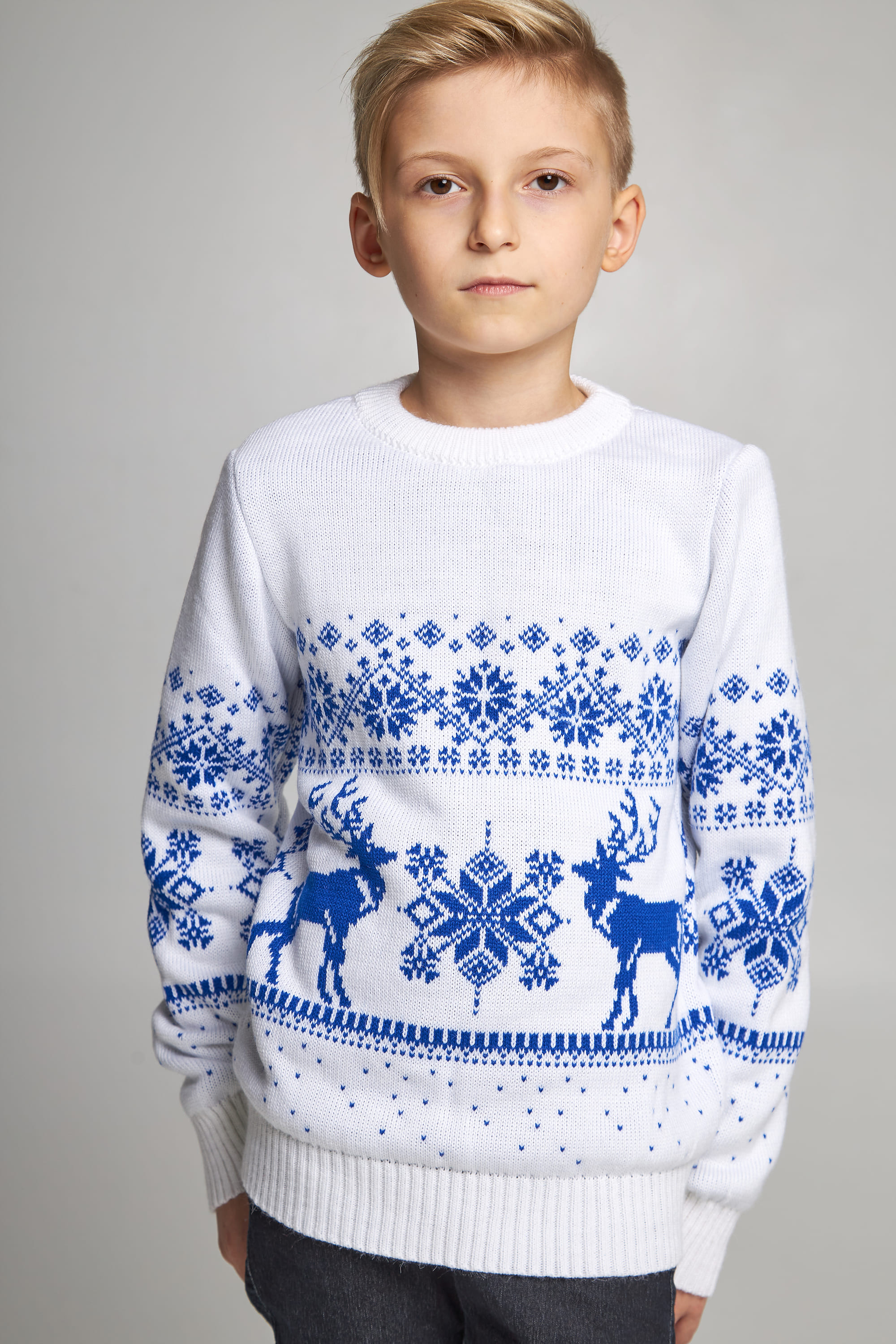 Knitted sweater for a boy snowflakes with deer white Knitted sweater for a boy snowflakes with deer white