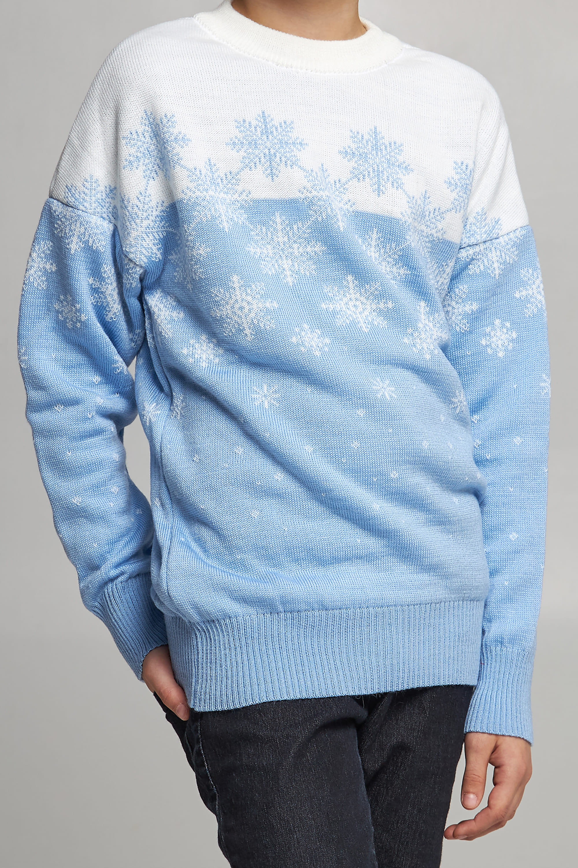 Knitted sweater for a boy Blue snowflakes
