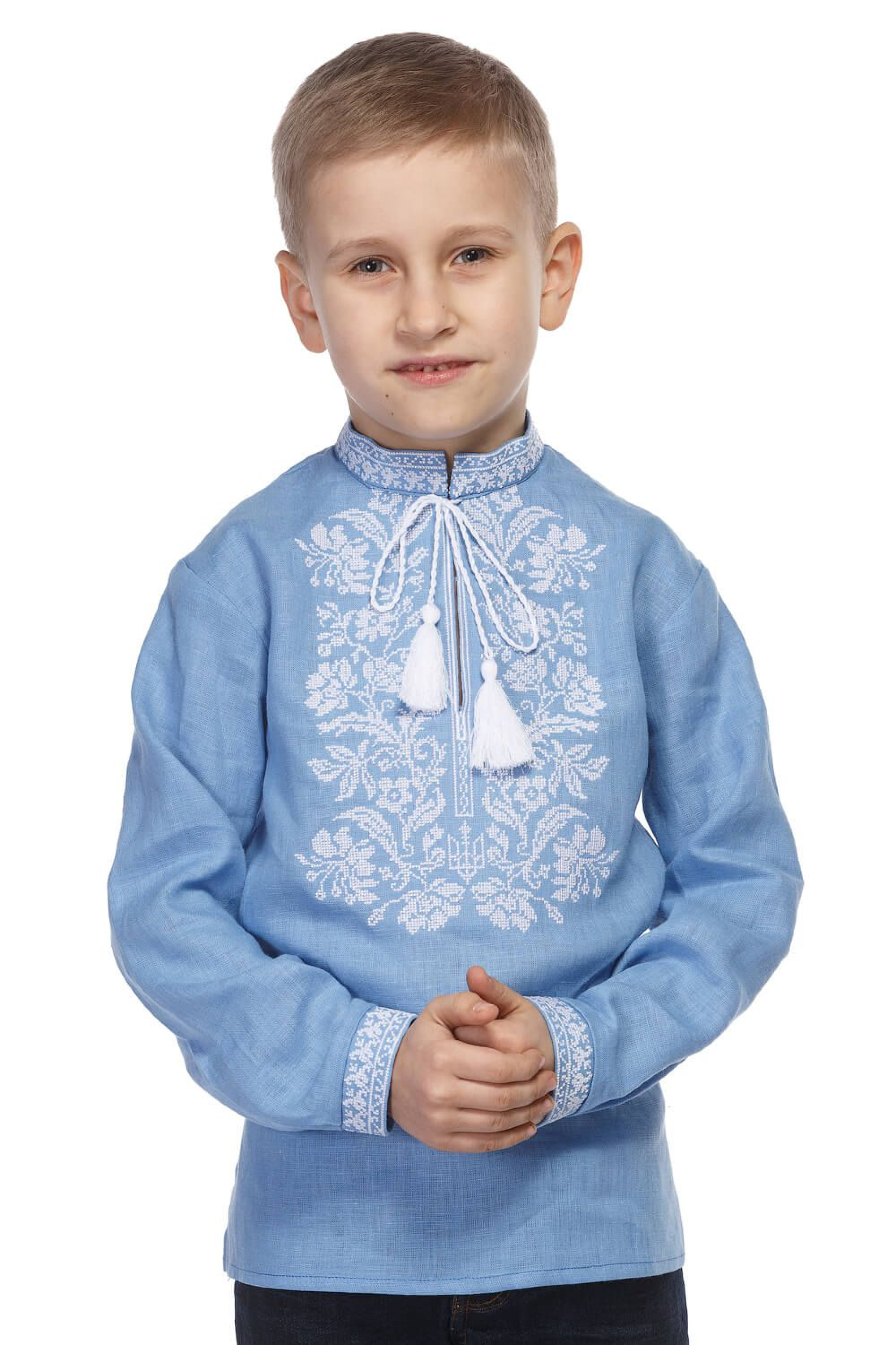 Blue shirt for a boy with white embroidery