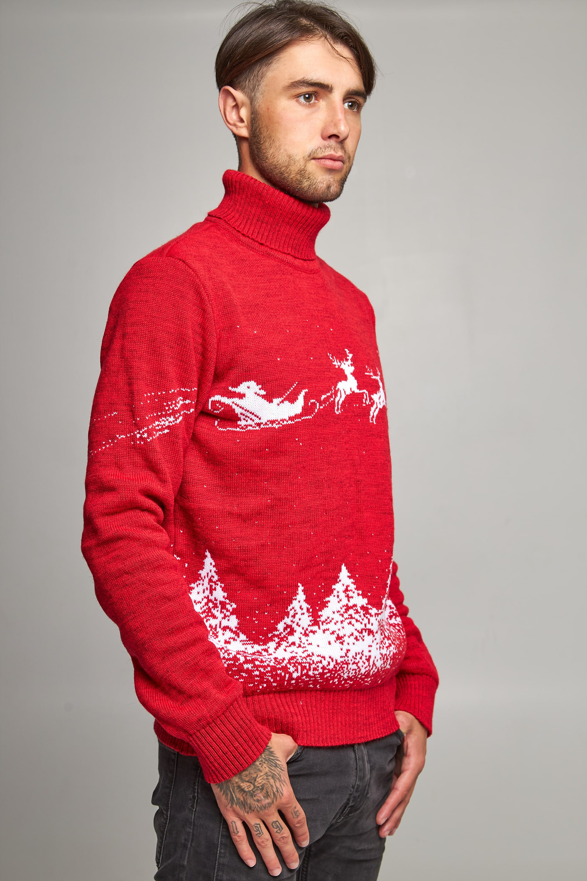 New Year's knitted golfs for two Santa Claus with deer red deer