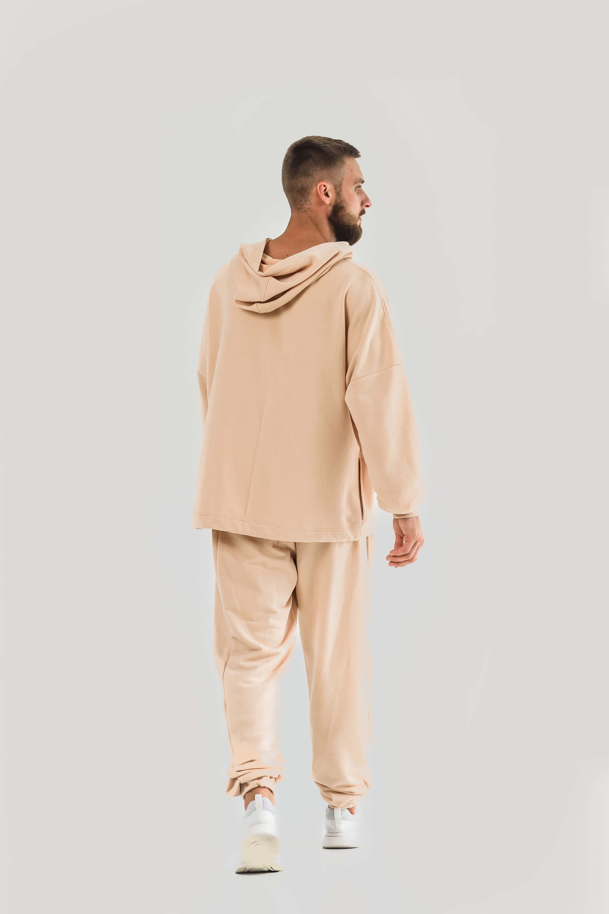 The costume is light beige