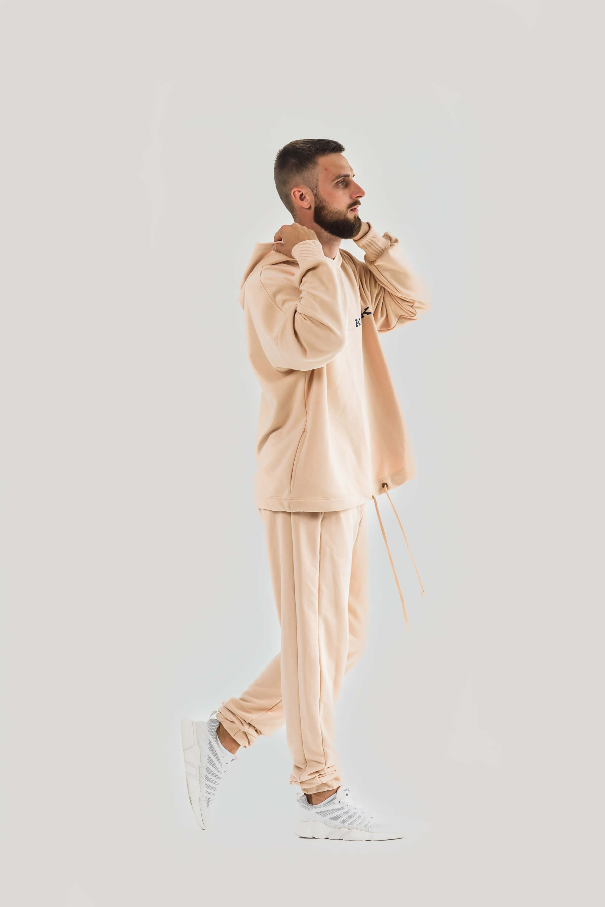 The costume is light beige