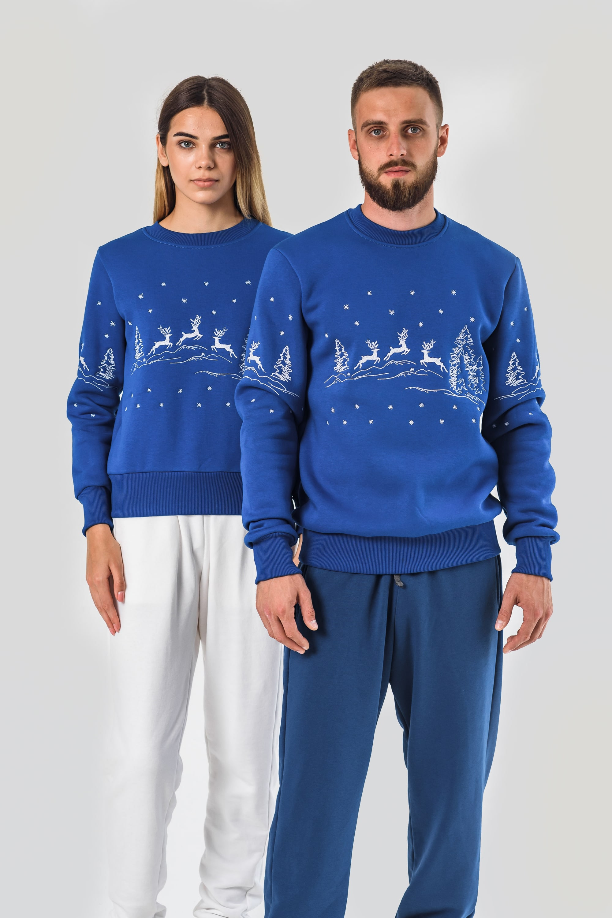 New Year's sweaters for two with deer electrician New Year's sweaters for two with deer electrician