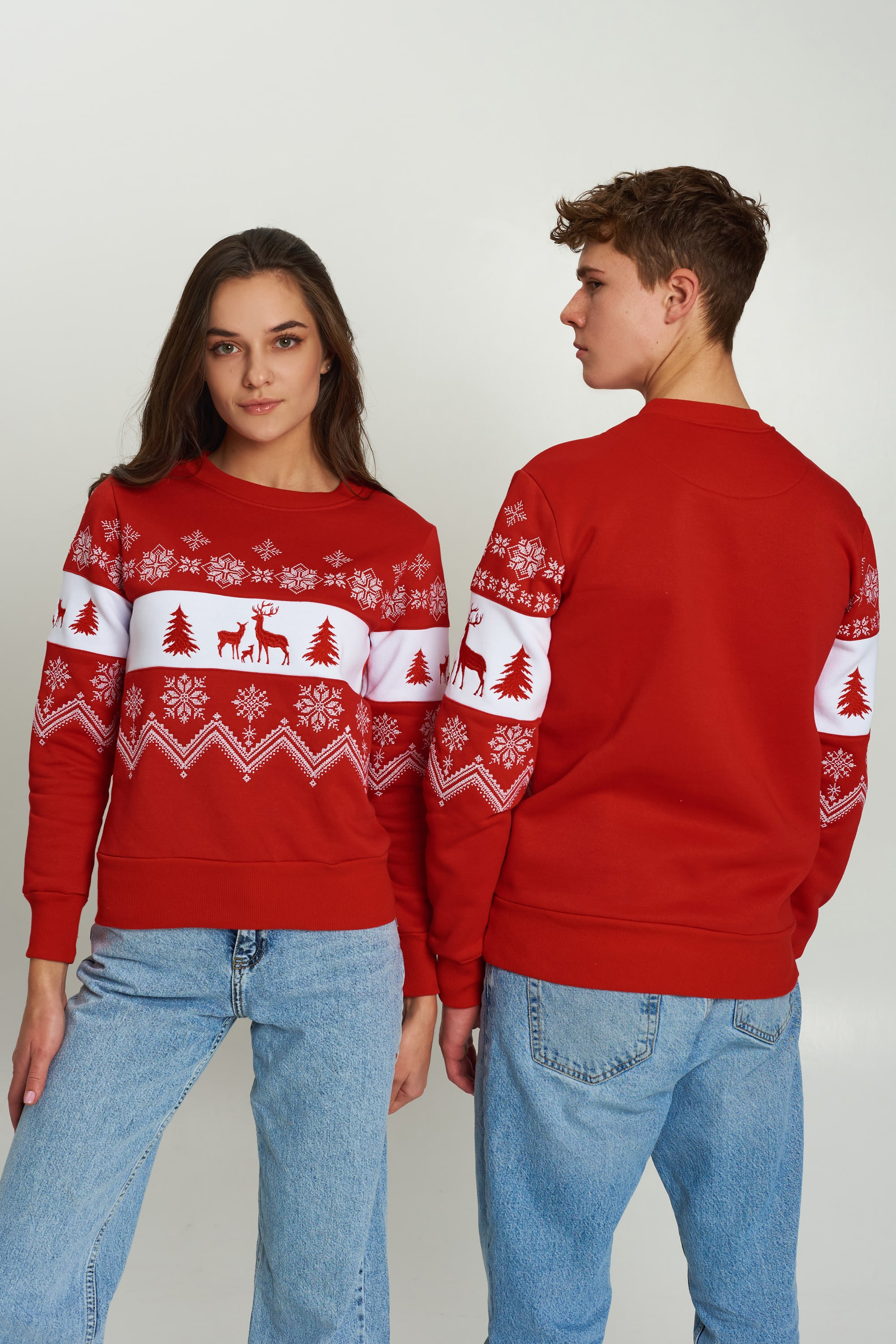 New Year's sweaters for two red