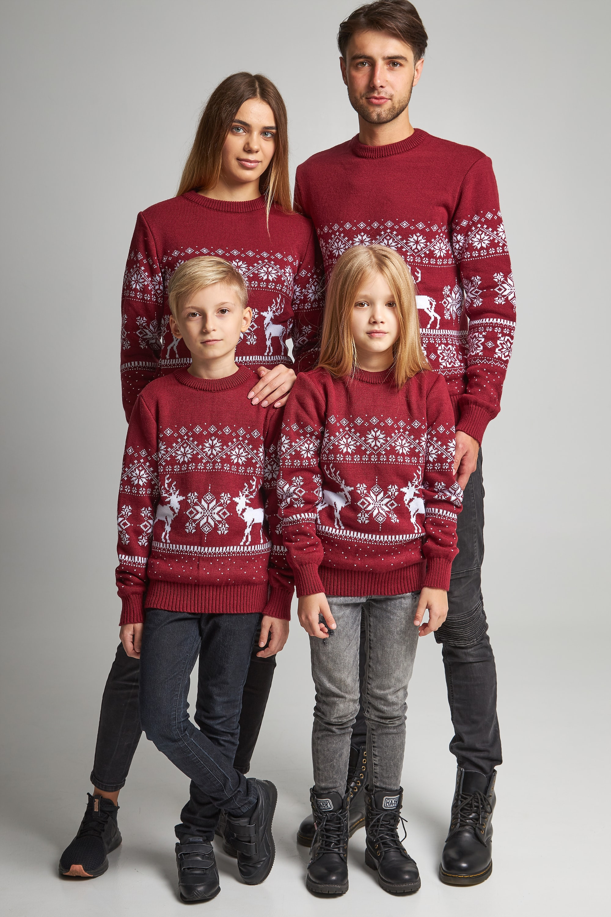 Family knitted Christmas sweaters snowflakes with deer burgundy