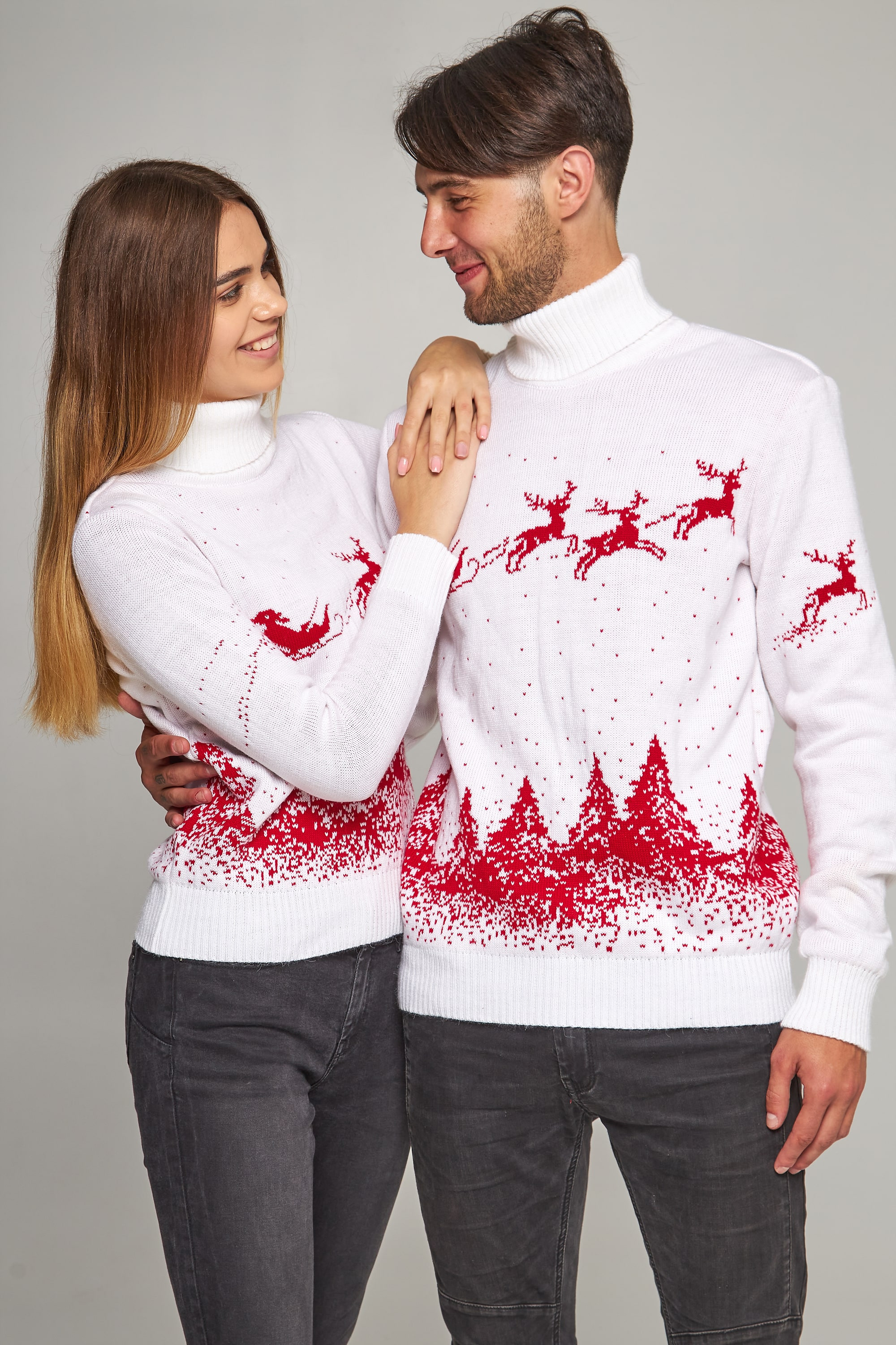 Family knitted Christmas sweaters with deer white