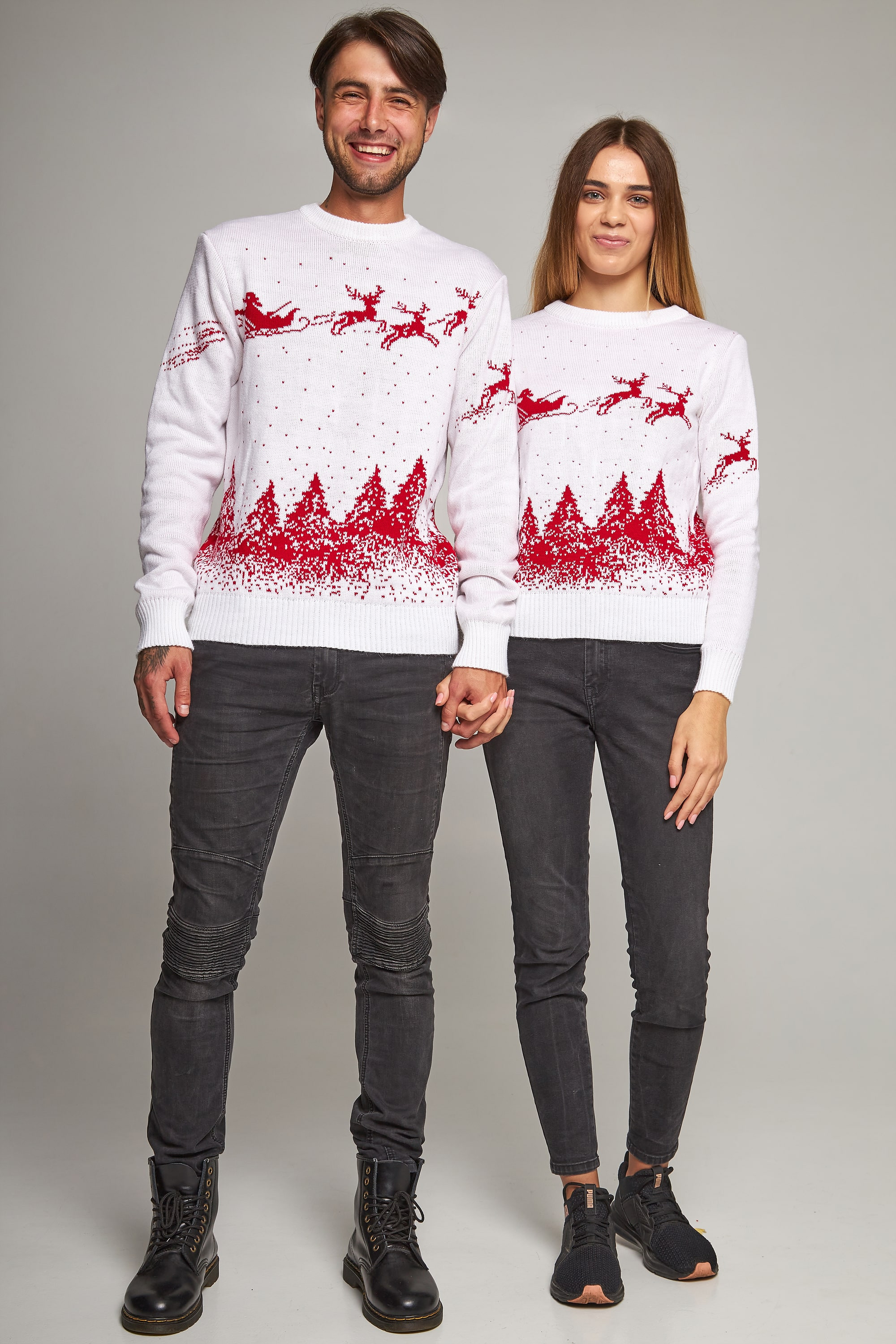 Family knitted Christmas sweaters with deer white