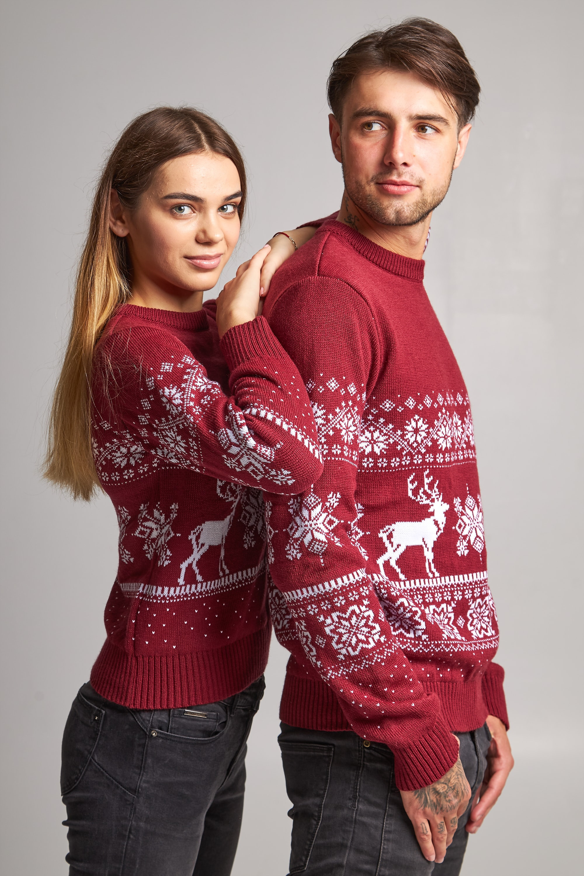 New Year's sweaters for two Santa Claus with deer burgundy