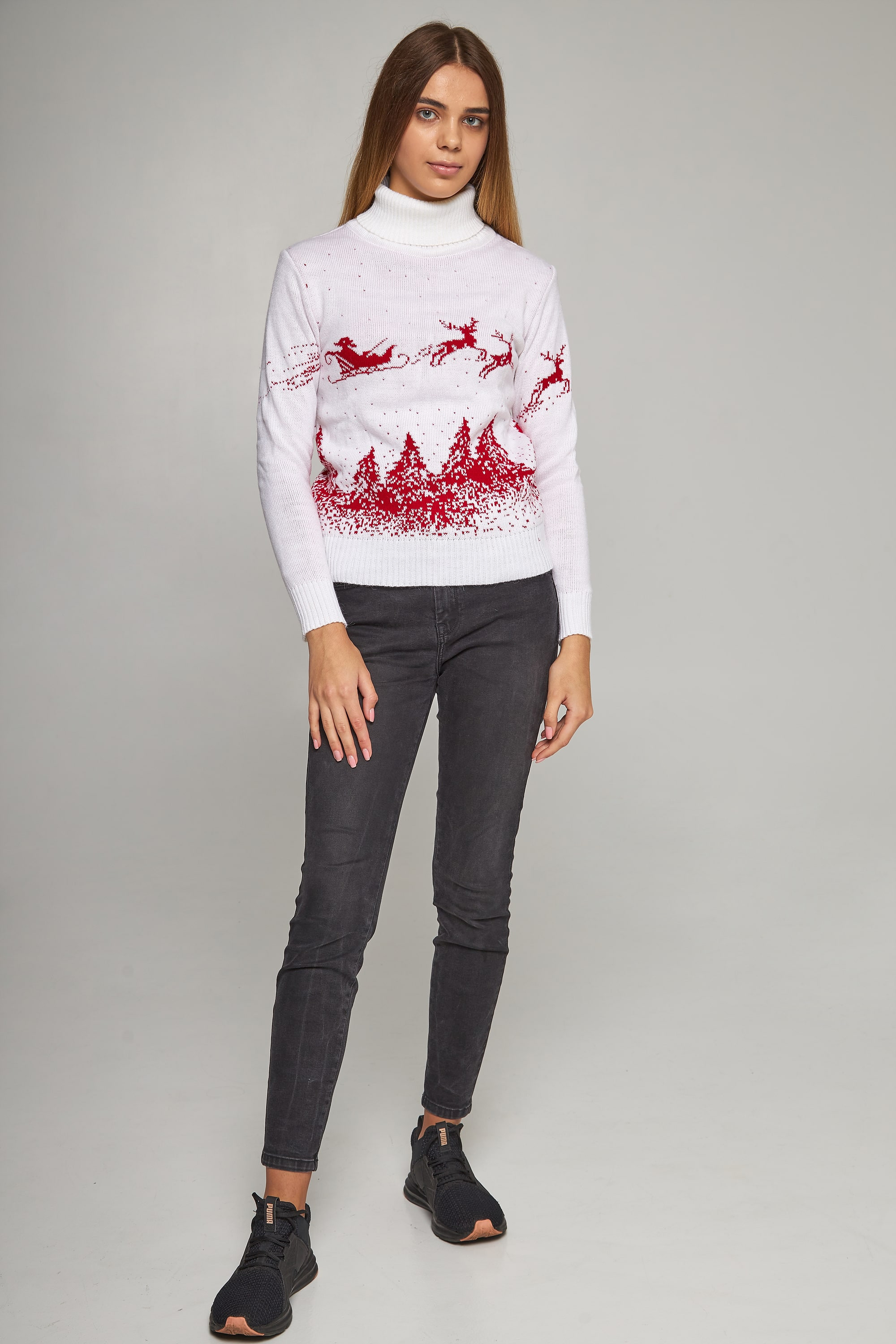 New Year's knitted golfs for two Santa Claus with deer