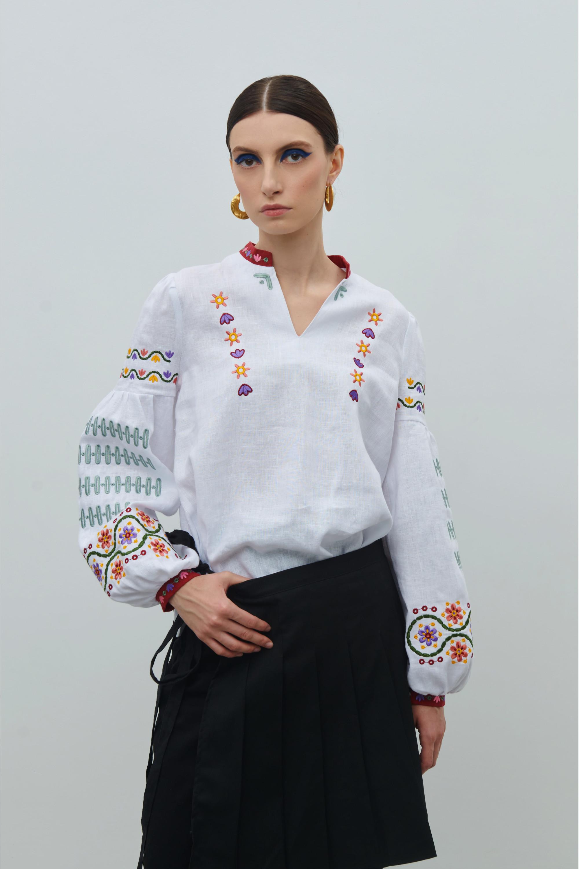Linen embroidery with floral ornament