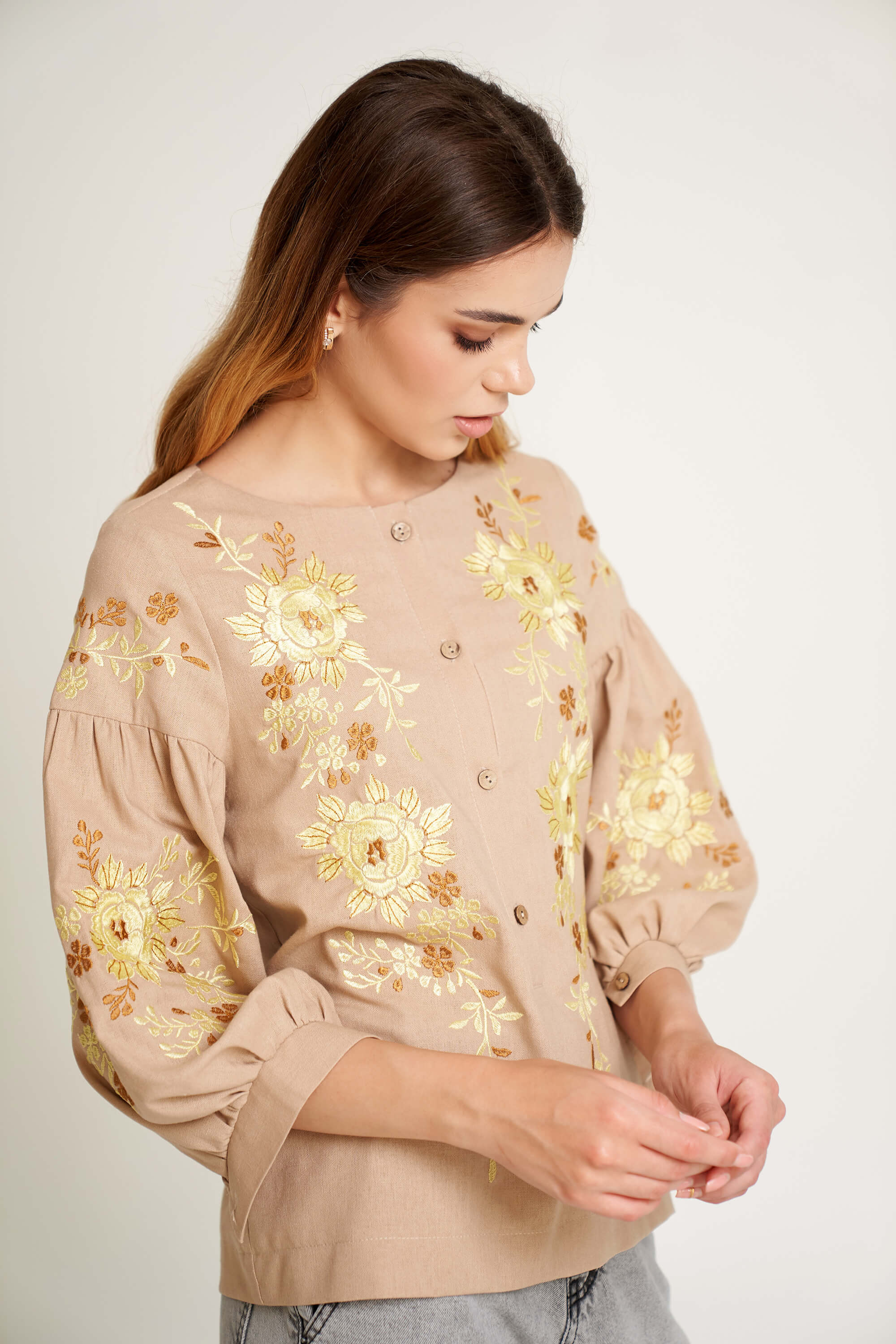 Women's beige blouse with yellow embroidery Women's beige blouse with yellow embroidery