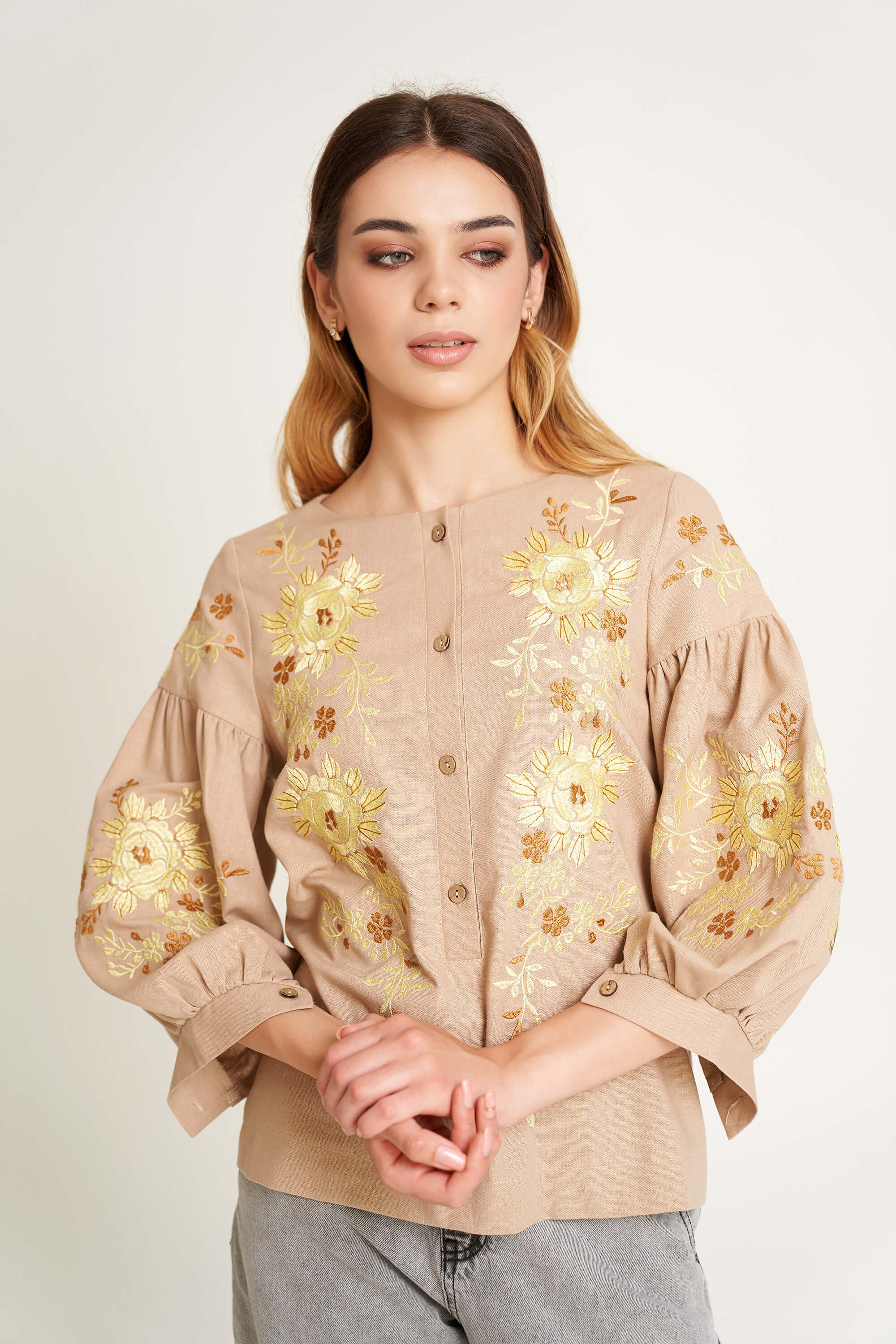 Women's beige blouse with yellow embroidery Women's beige blouse with yellow embroidery