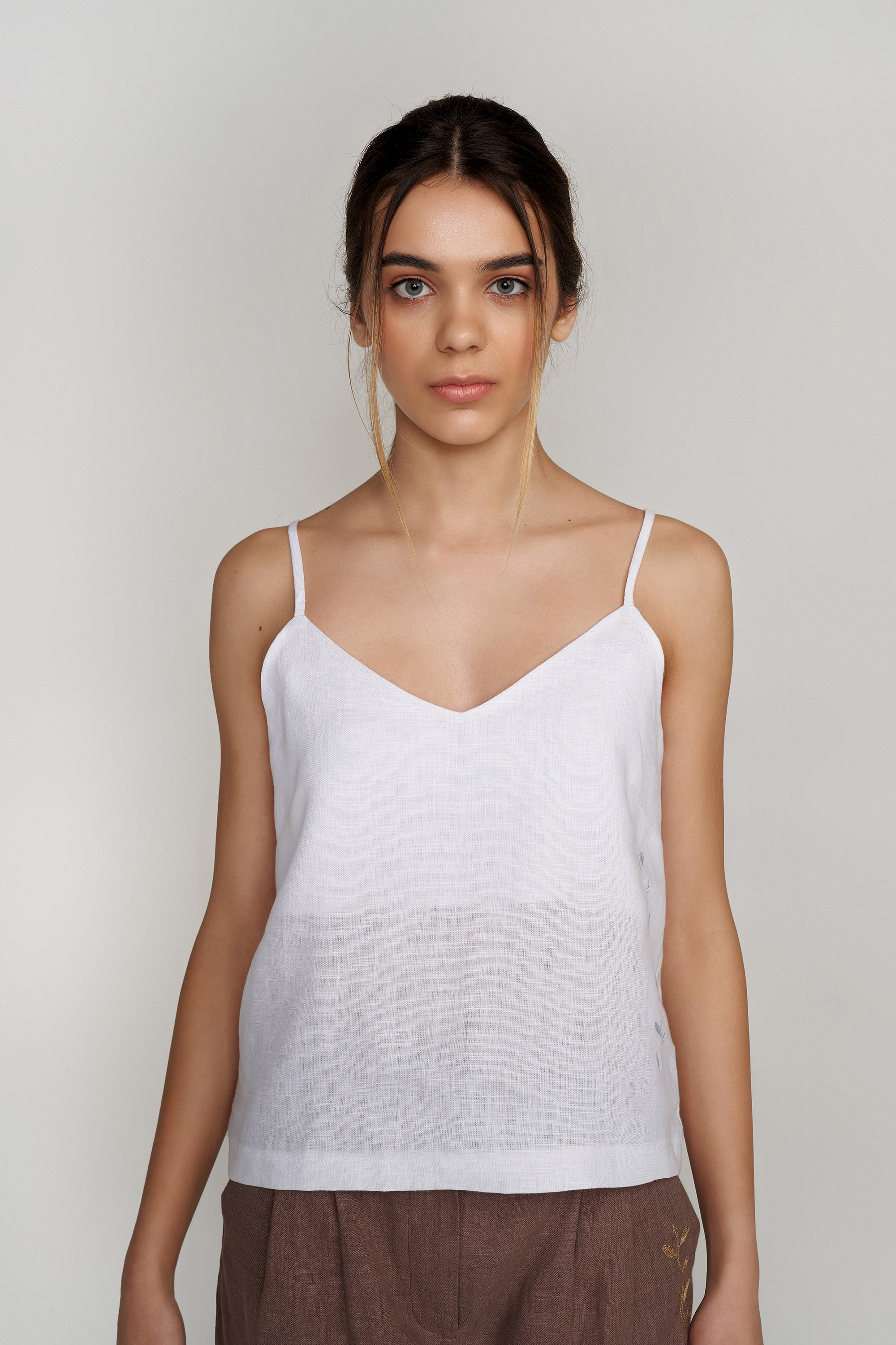 Women's white T-shirt on straps