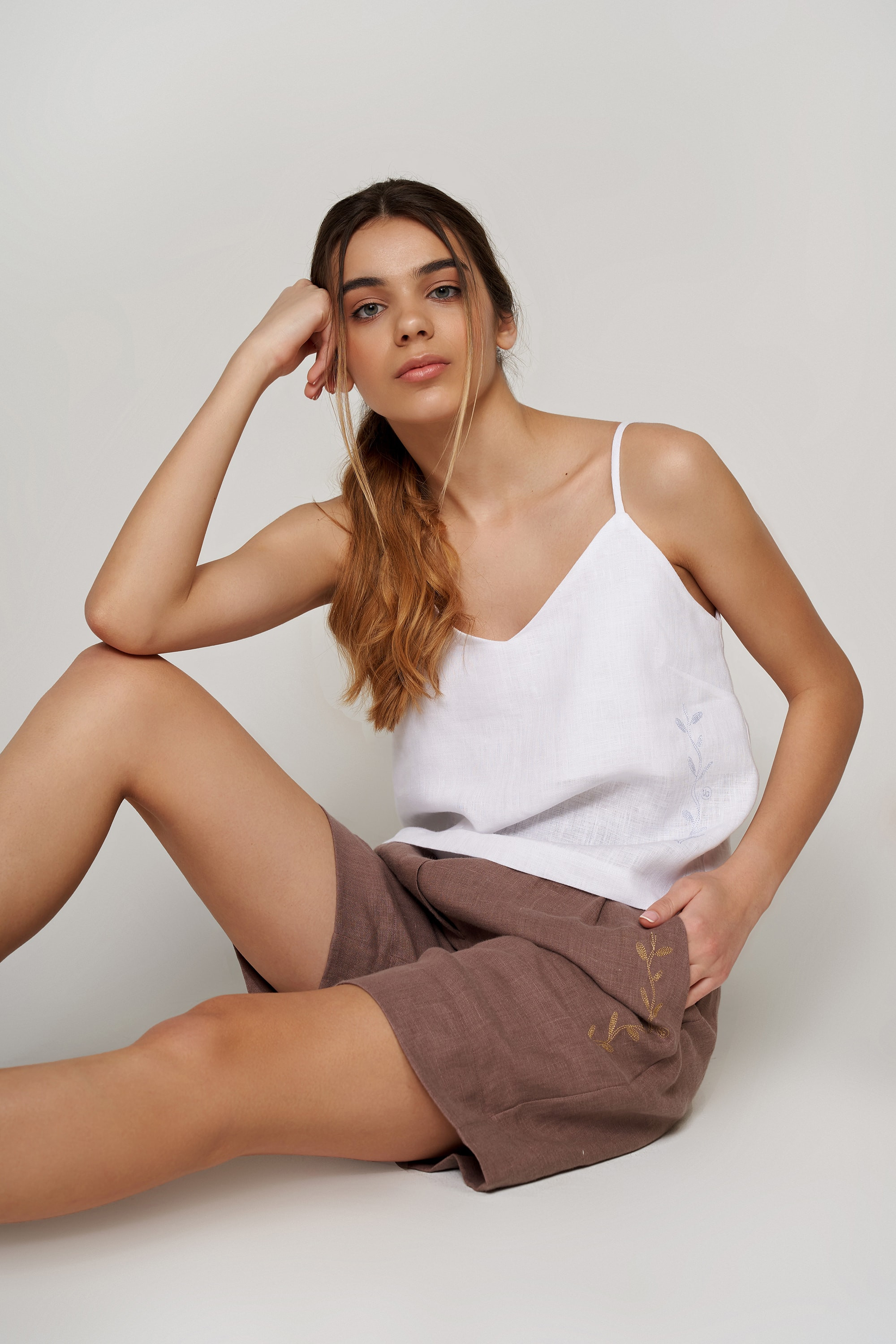 Women's white T-shirt on straps