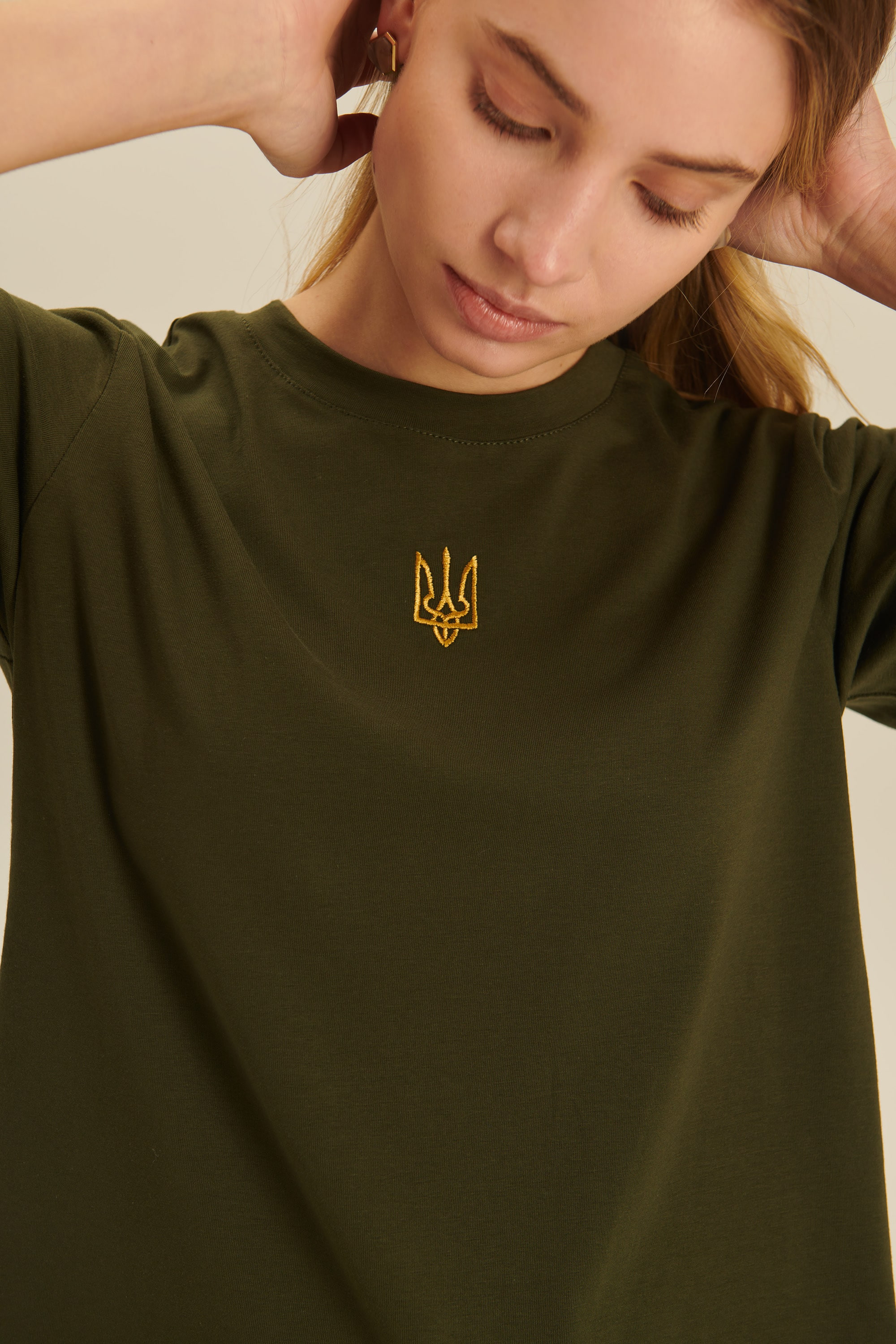 Women's embroidered T-shirt with the coat of arms of Ukraine