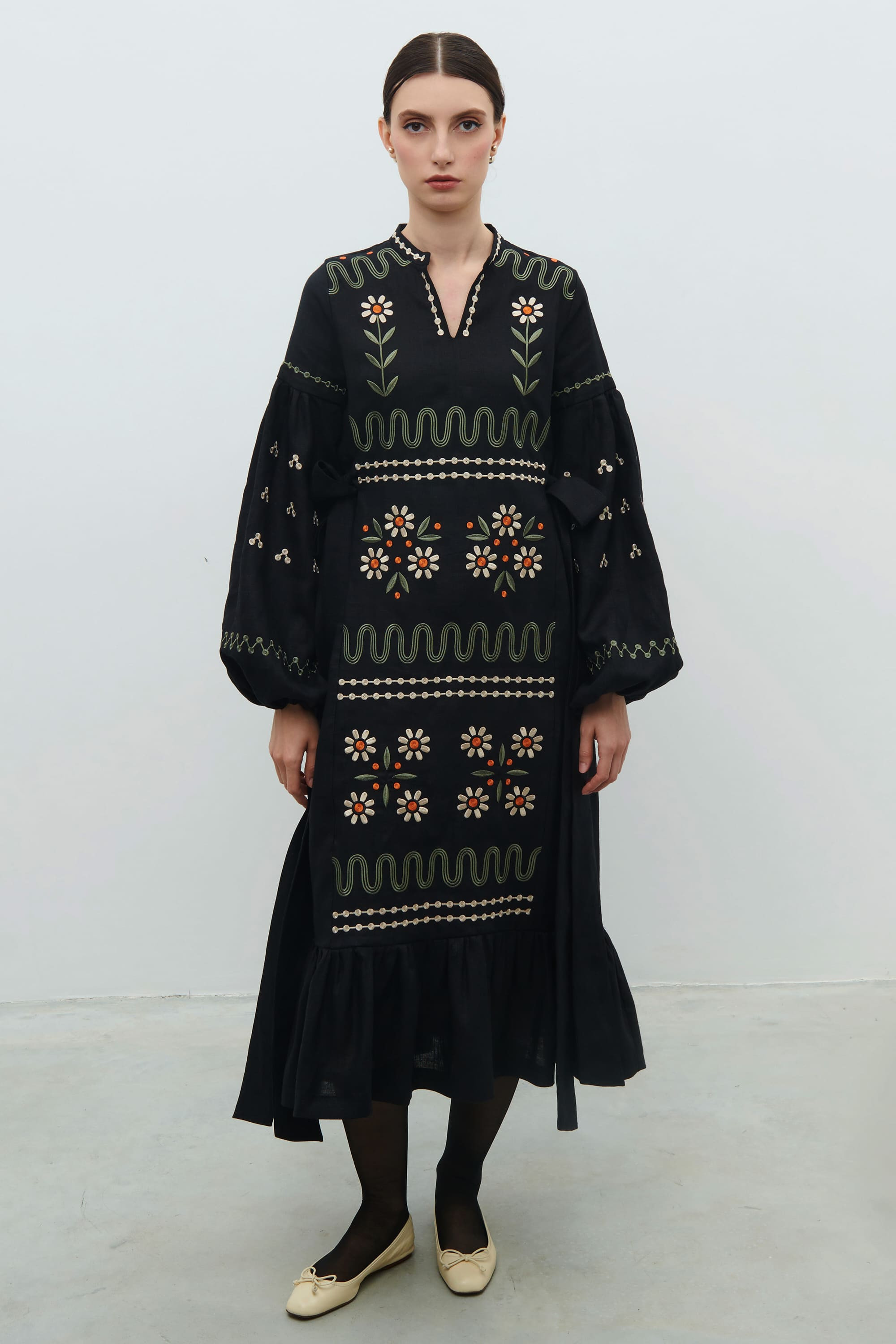 Embroidered black dress. The flourishing of Maria Prymachenko's work