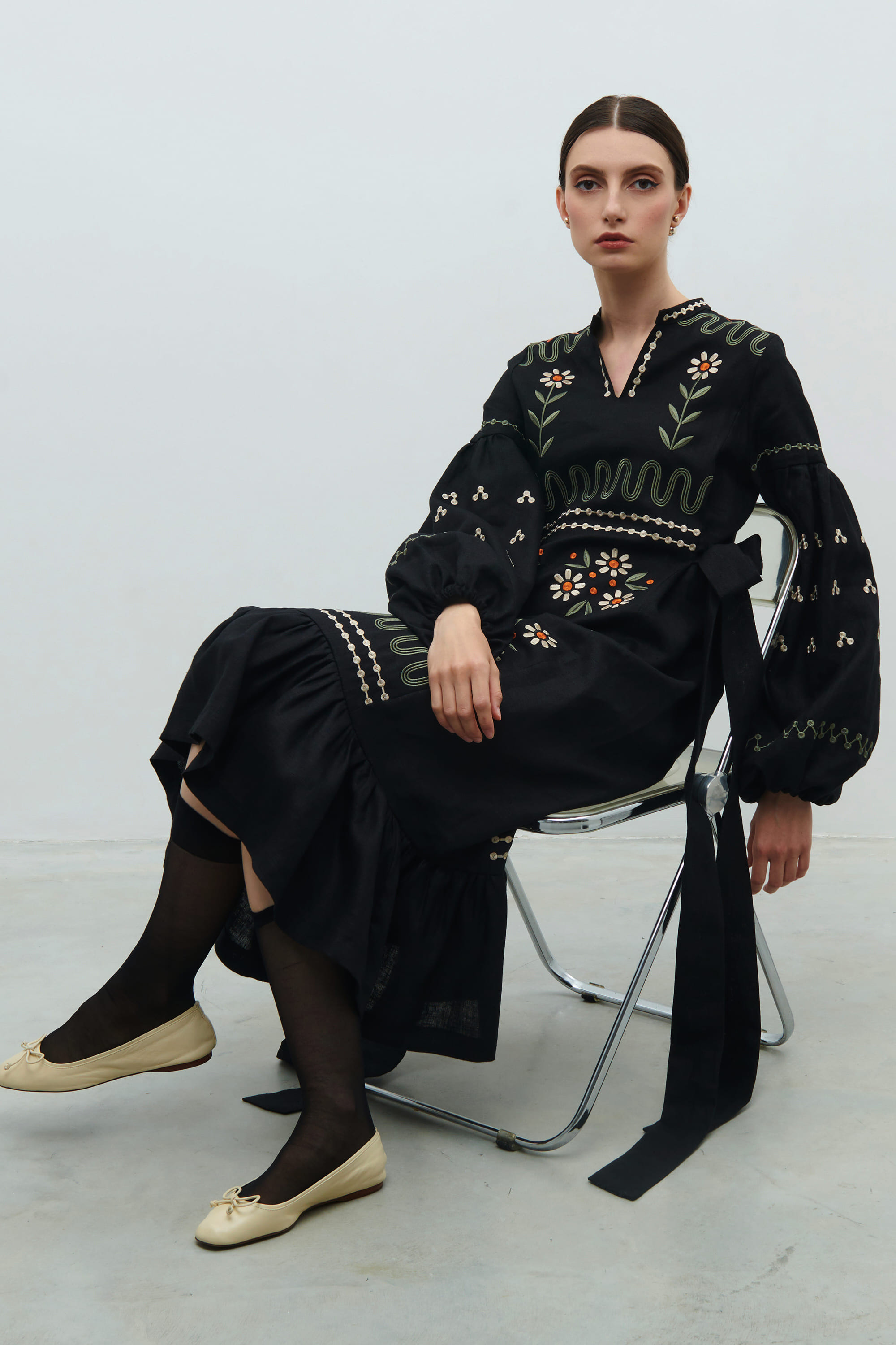 Embroidered black dress. The flourishing of Maria Prymachenko's work