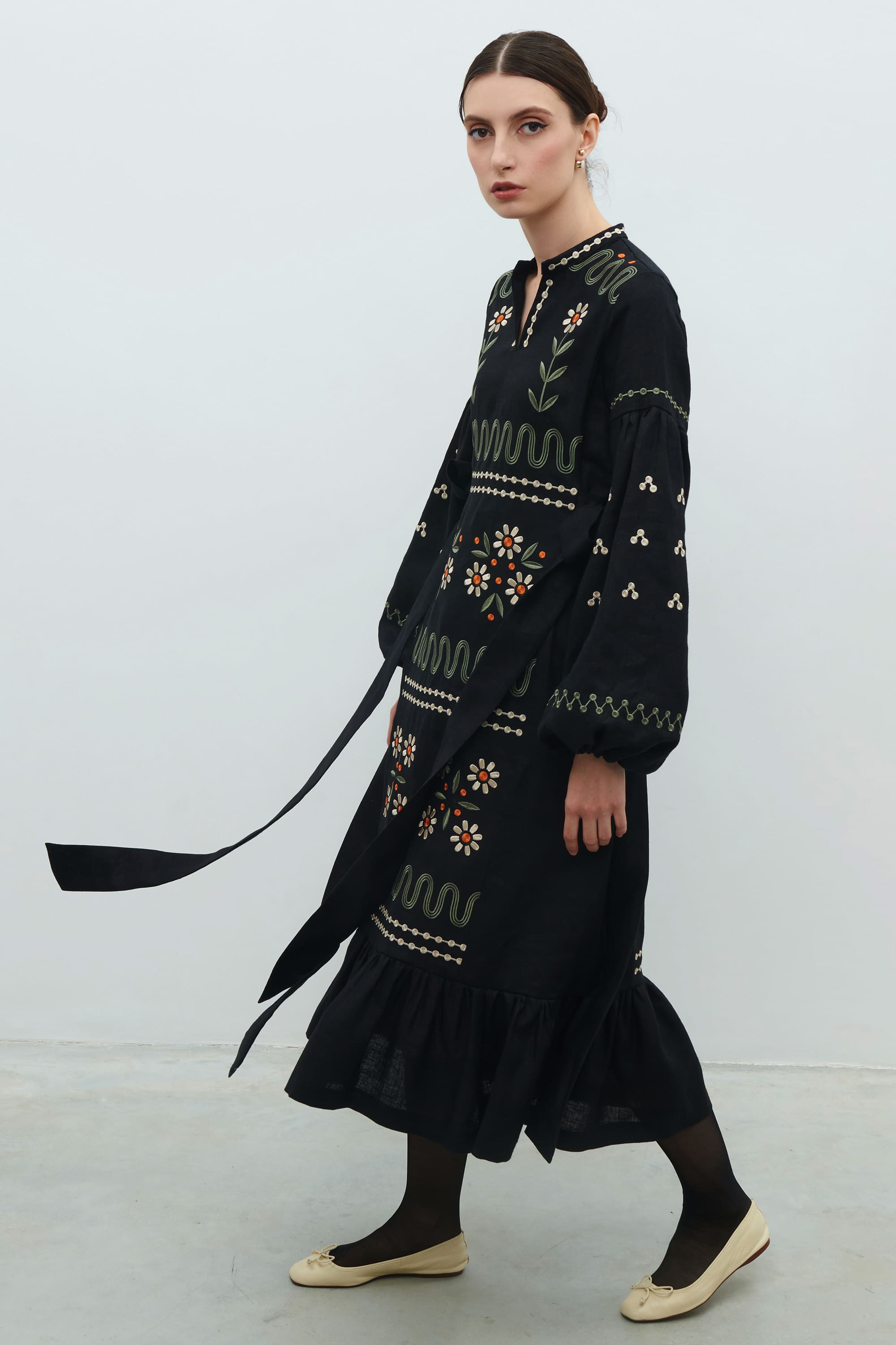 Embroidered black dress. The flourishing of Maria Prymachenko's work